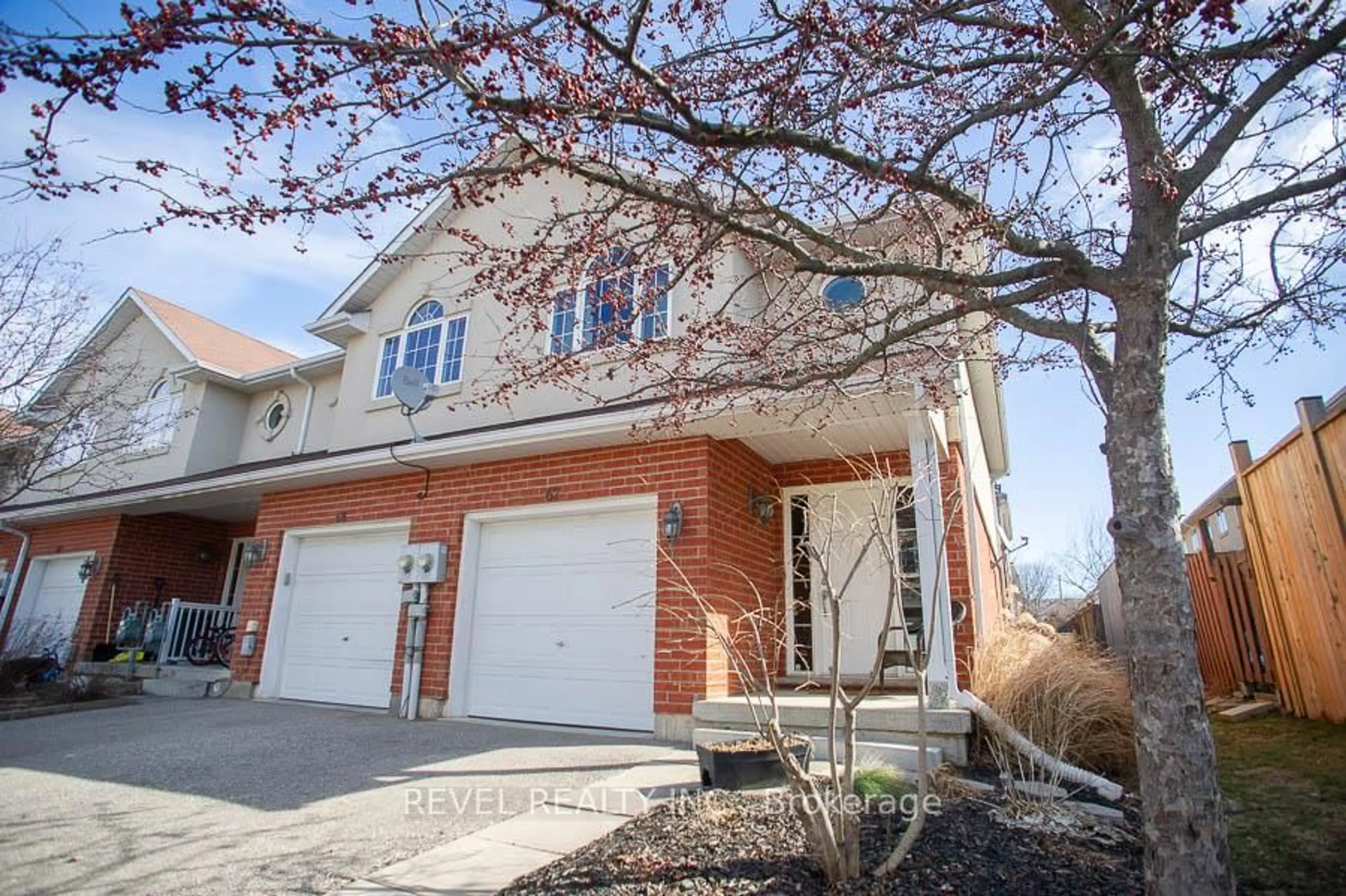 Home with brick exterior material, street for 20 McConkey Cres #67, Brantford Ontario N3S 0C1