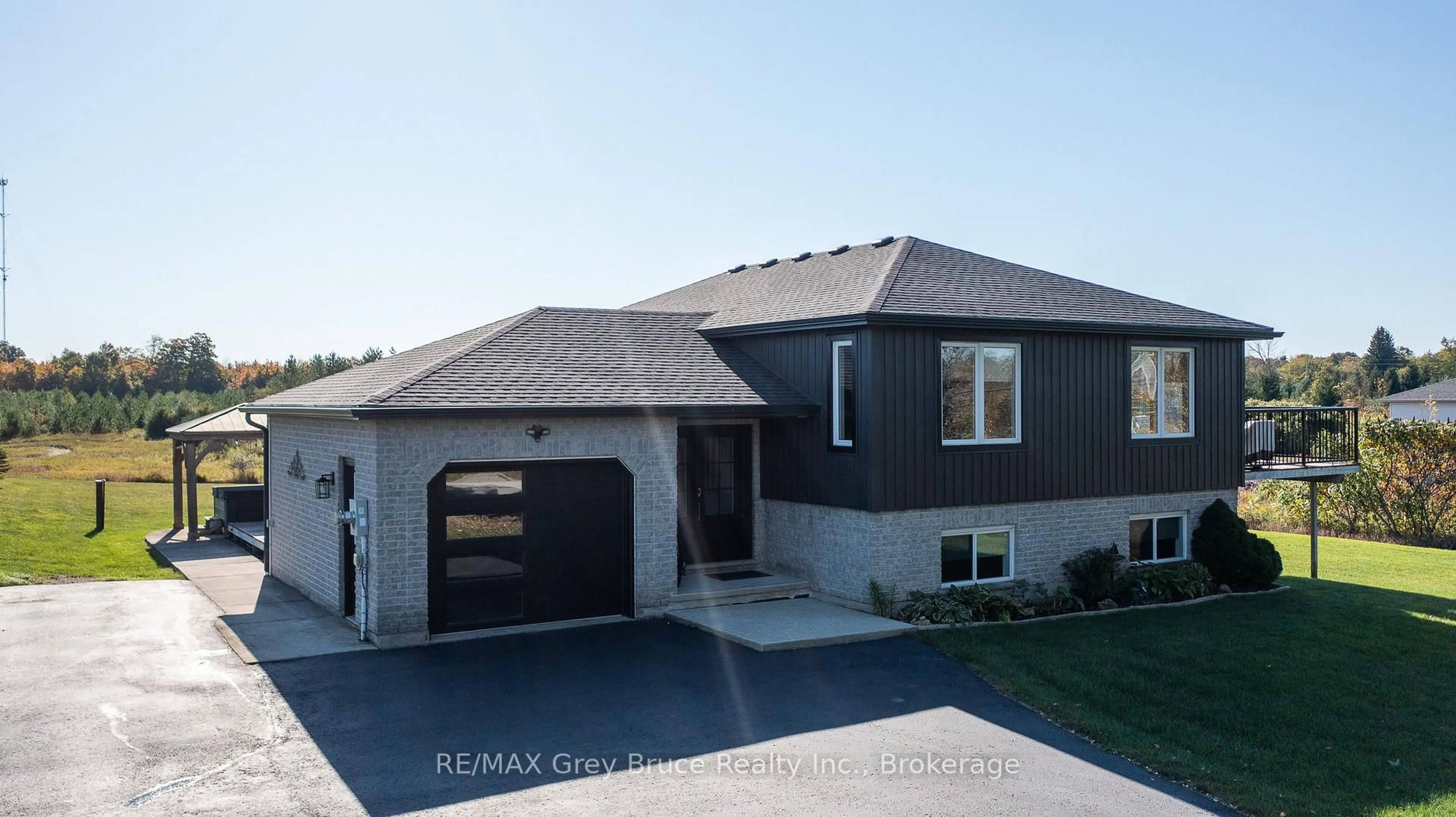 Home with vinyl exterior material, street for 200050 10 Sdrd, Georgian Bluffs Ontario N0H 2K0