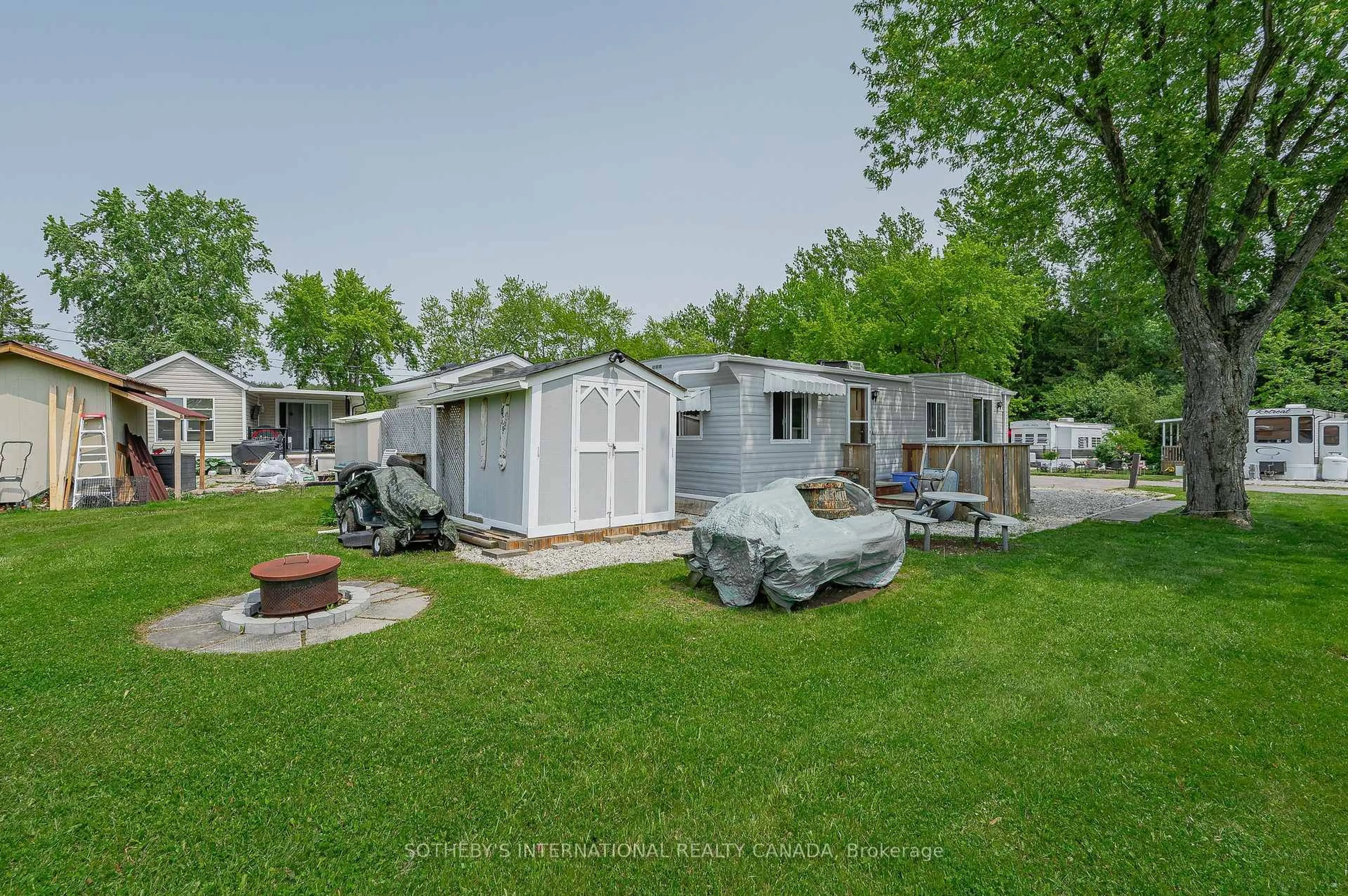 A pic from outside/outdoor area/front of a property/back of a property/a pic from drone, street for 580 Beaver Creek Rd #215, Waterloo Ontario N2J 3Z4