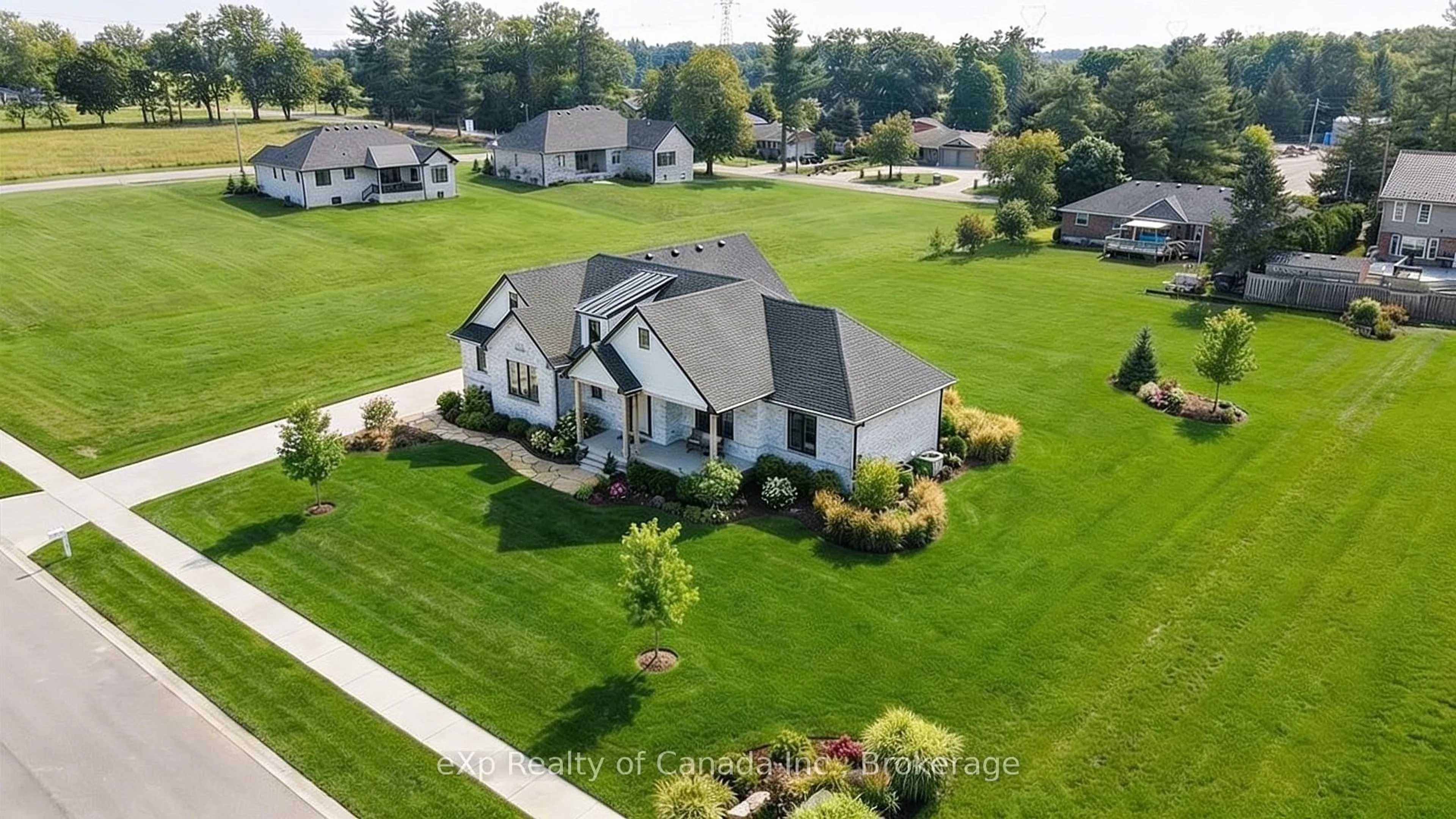 A pic from outside/outdoor area/front of a property/back of a property/a pic from drone, street for 65 Meadowlands Dr, Norwich Ontario N0J 1R0