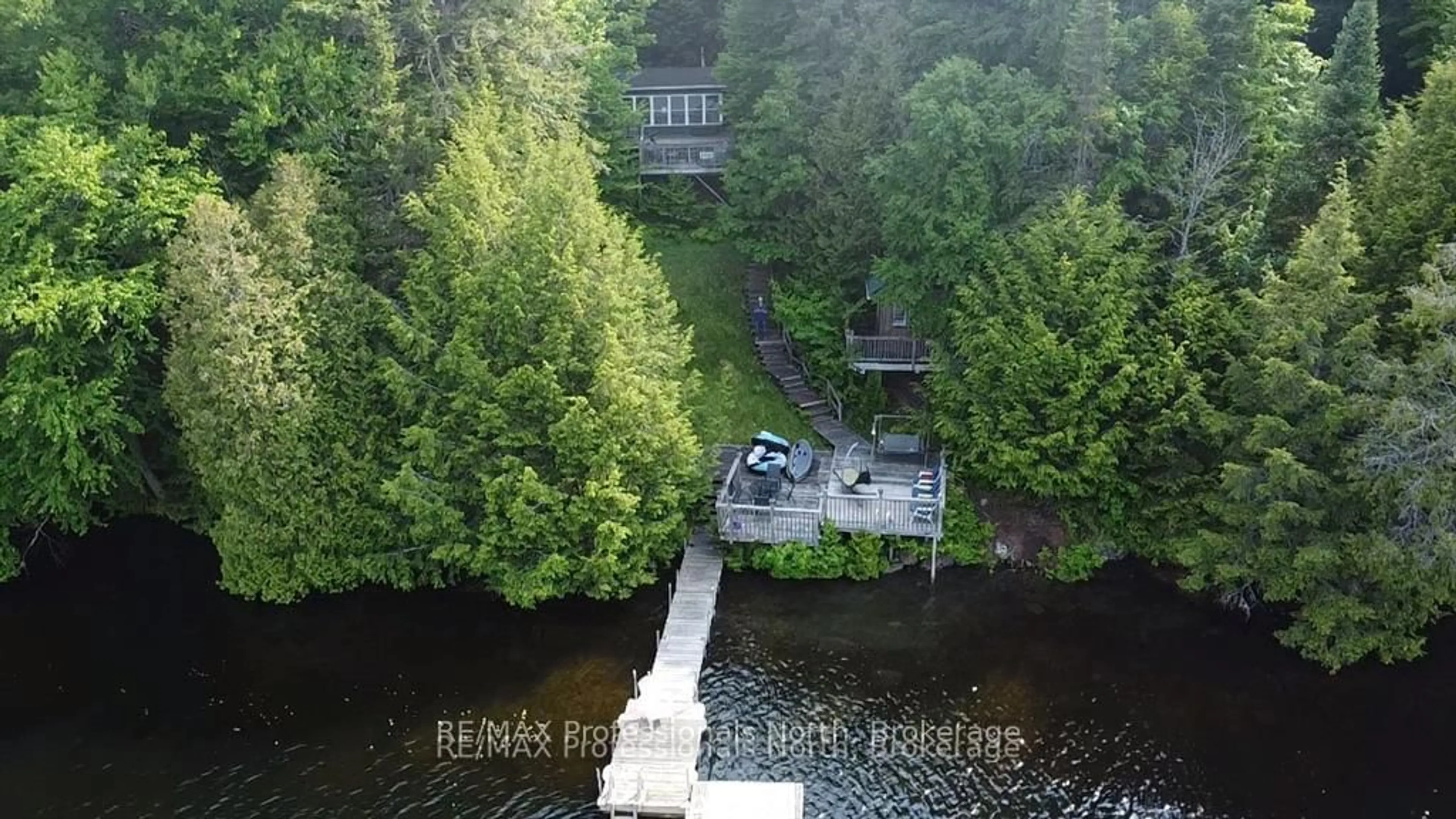 A pic from outside/outdoor area/front of a property/back of a property/a pic from drone, water/lake/river/ocean view for 69 Maple Dr, Perry Ontario P0A 1J0
