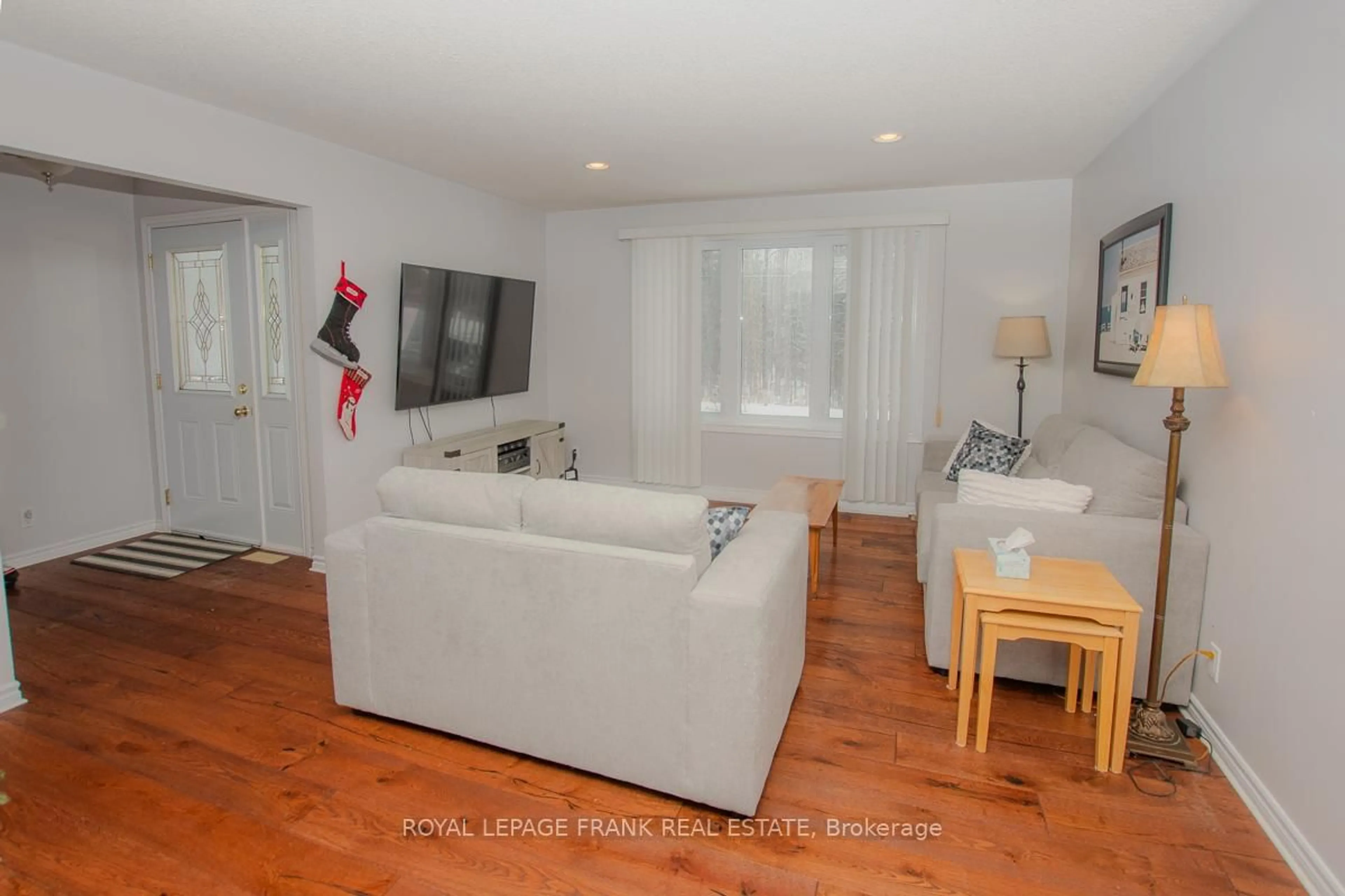 Living room with furniture, wood/laminate floor for 730 Old Norwood Rd, Havelock-Belmont-Methuen Ontario K0L 1Z0