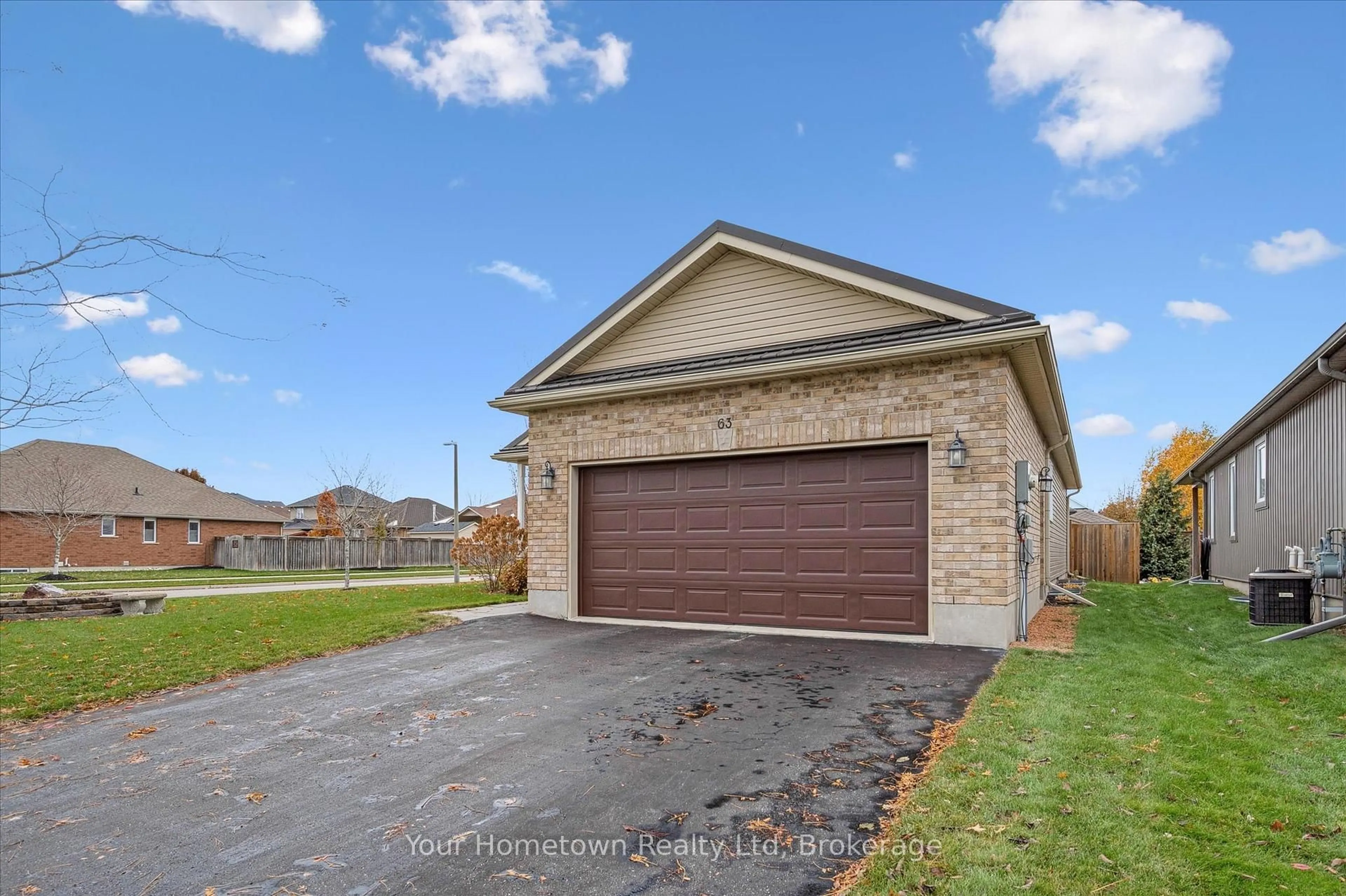 Home with brick exterior material, street for 63 Spencer Dr, Centre Wellington Ontario N0B 1S0