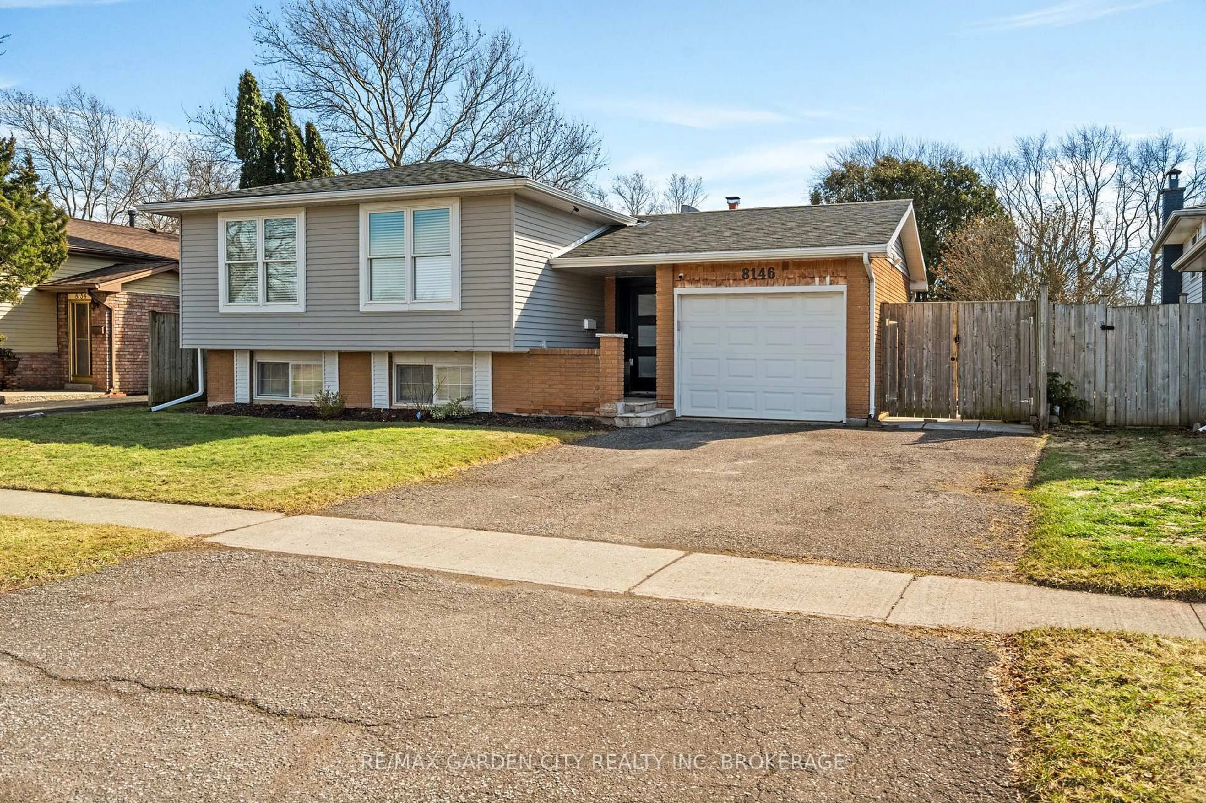 Home with vinyl exterior material, street for 8146 WESTWOOD St, Niagara Falls Ontario L2H 1Y2