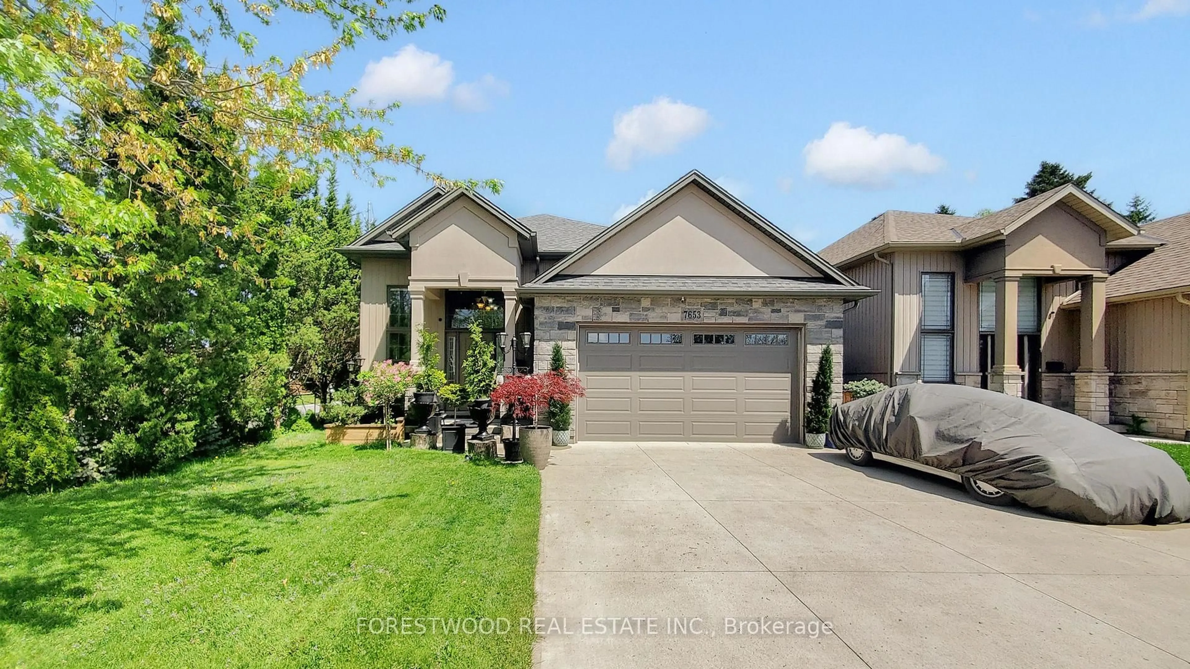 Home with vinyl exterior material, street for 7653 Mulhern St, Niagara Falls Ontario L2H 1B2