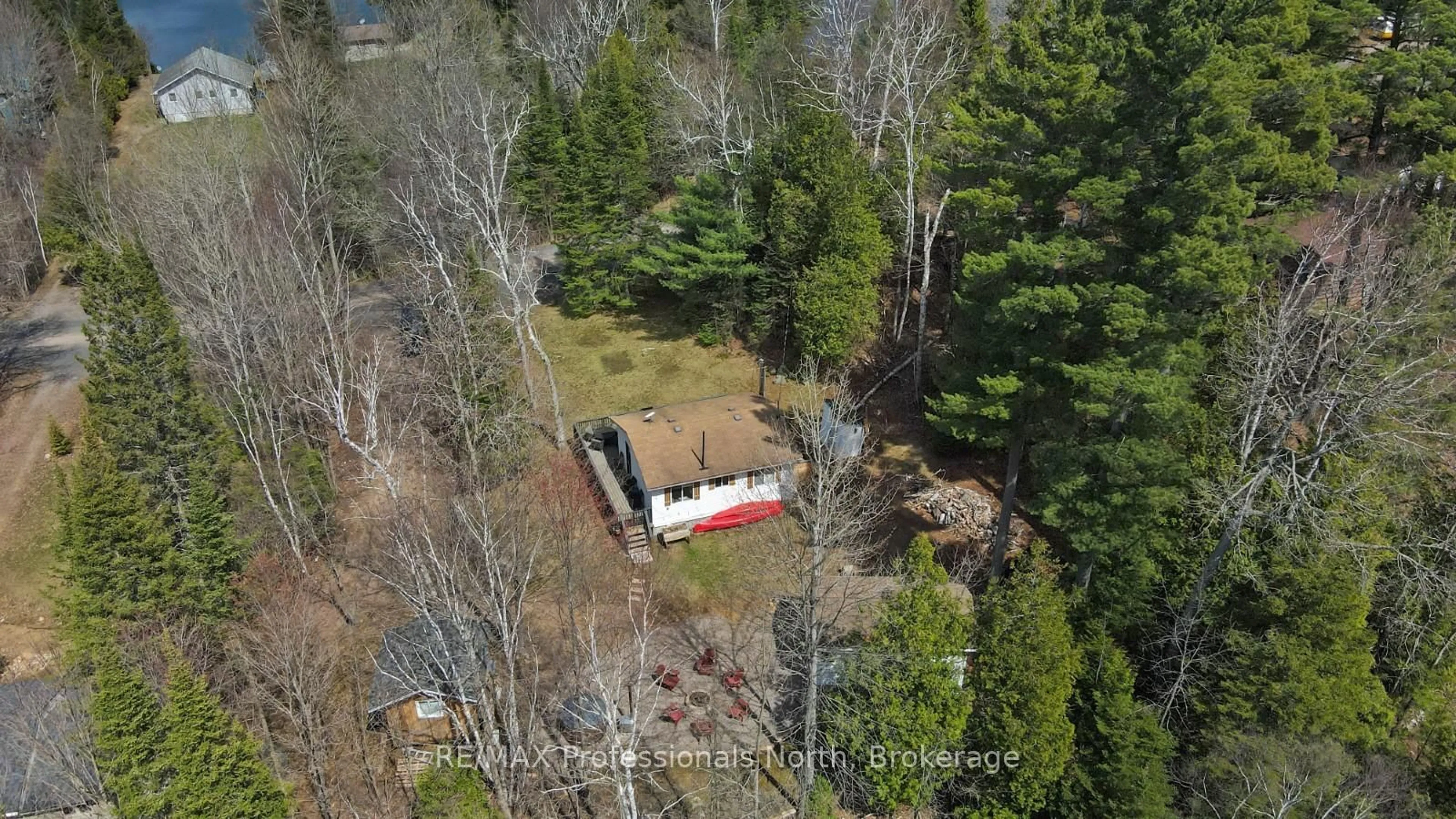 A pic from outside/outdoor area/front of a property/back of a property/a pic from drone, forest/trees view for 1419 Clement Lake Rd, Highlands East Ontario K0L 3C0