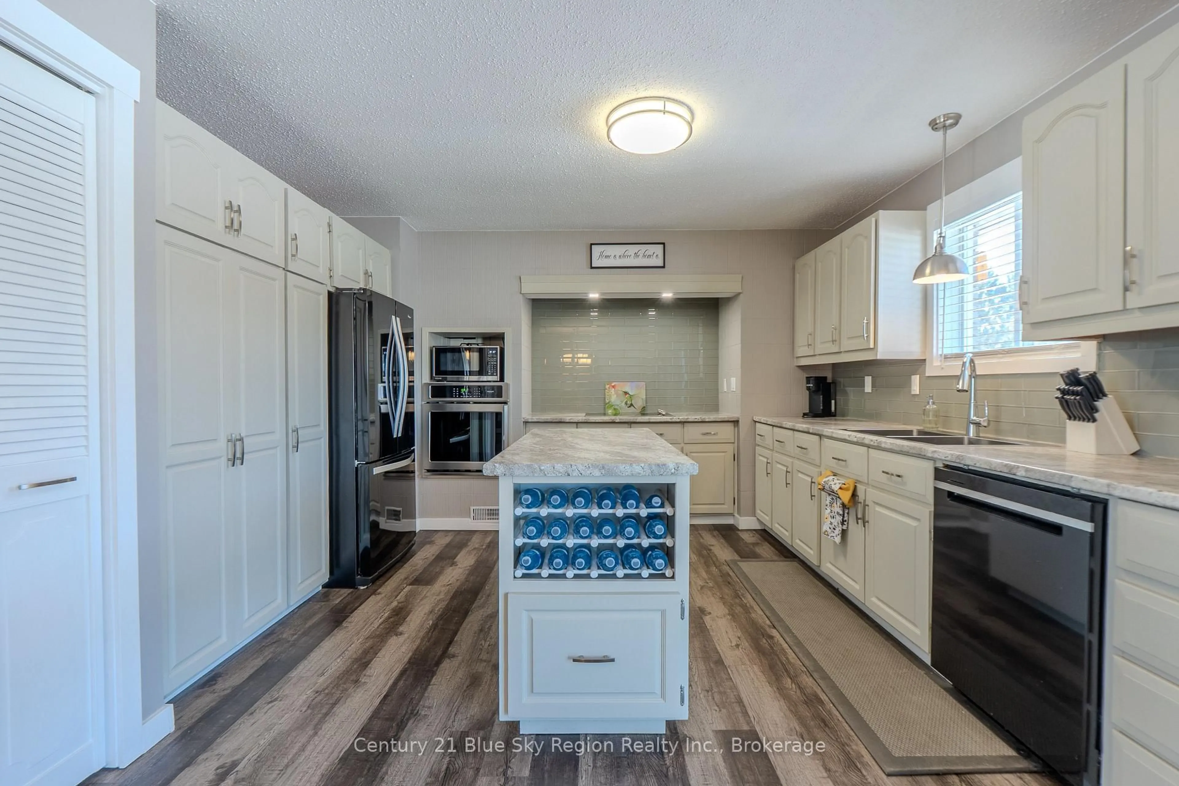 Open concept kitchen, ceramic/tile floor for 10695 Highway 64, West Nipissing Ontario P0H 1R0