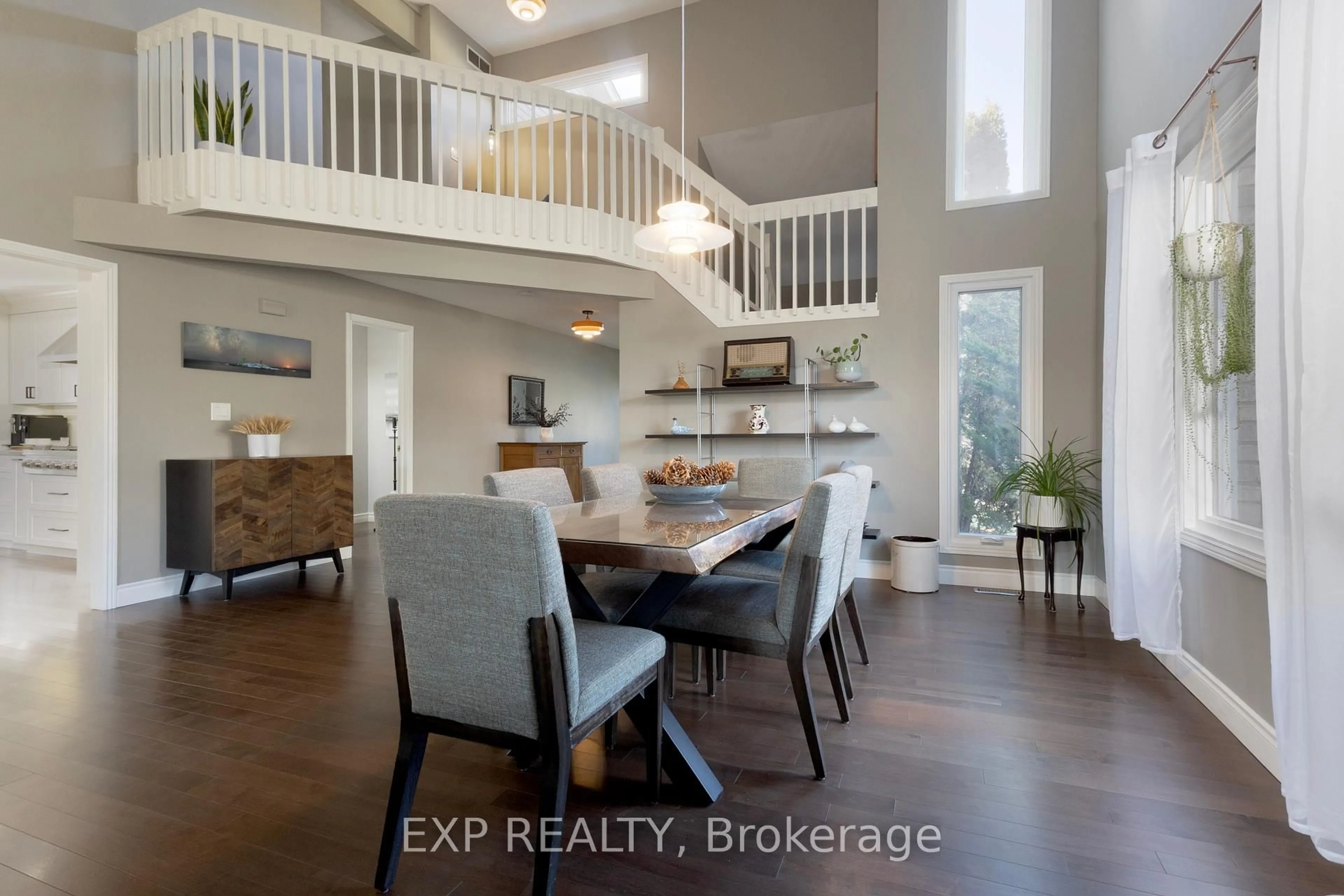 Open concept kitchen, wood/laminate floor for 109 Parkview Dr, Thames Centre Ontario N0L 1G2