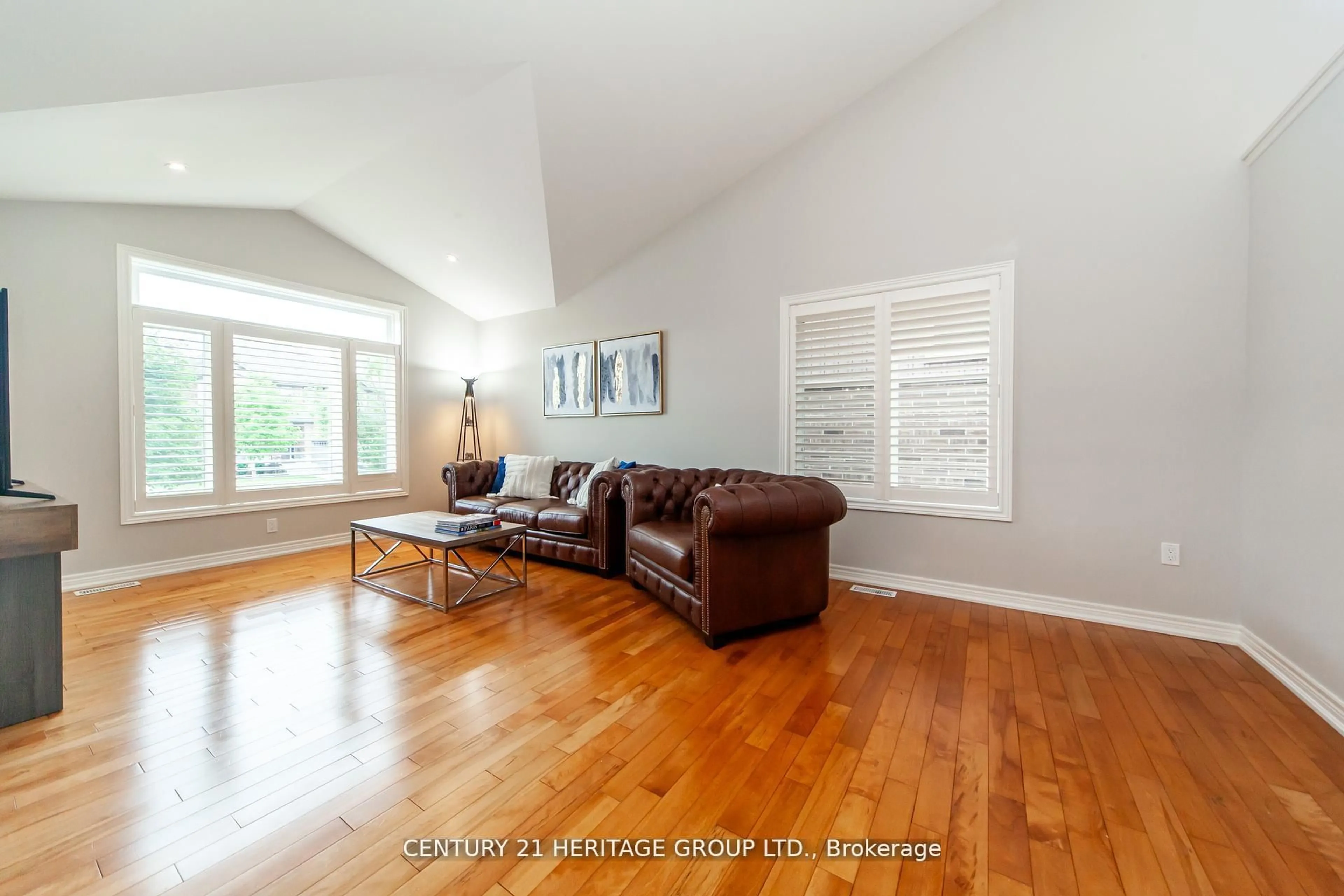 Living room with furniture, wood/laminate floor for 5826 Fiddlehead Lane, Niagara Falls Ontario L2H 0E9