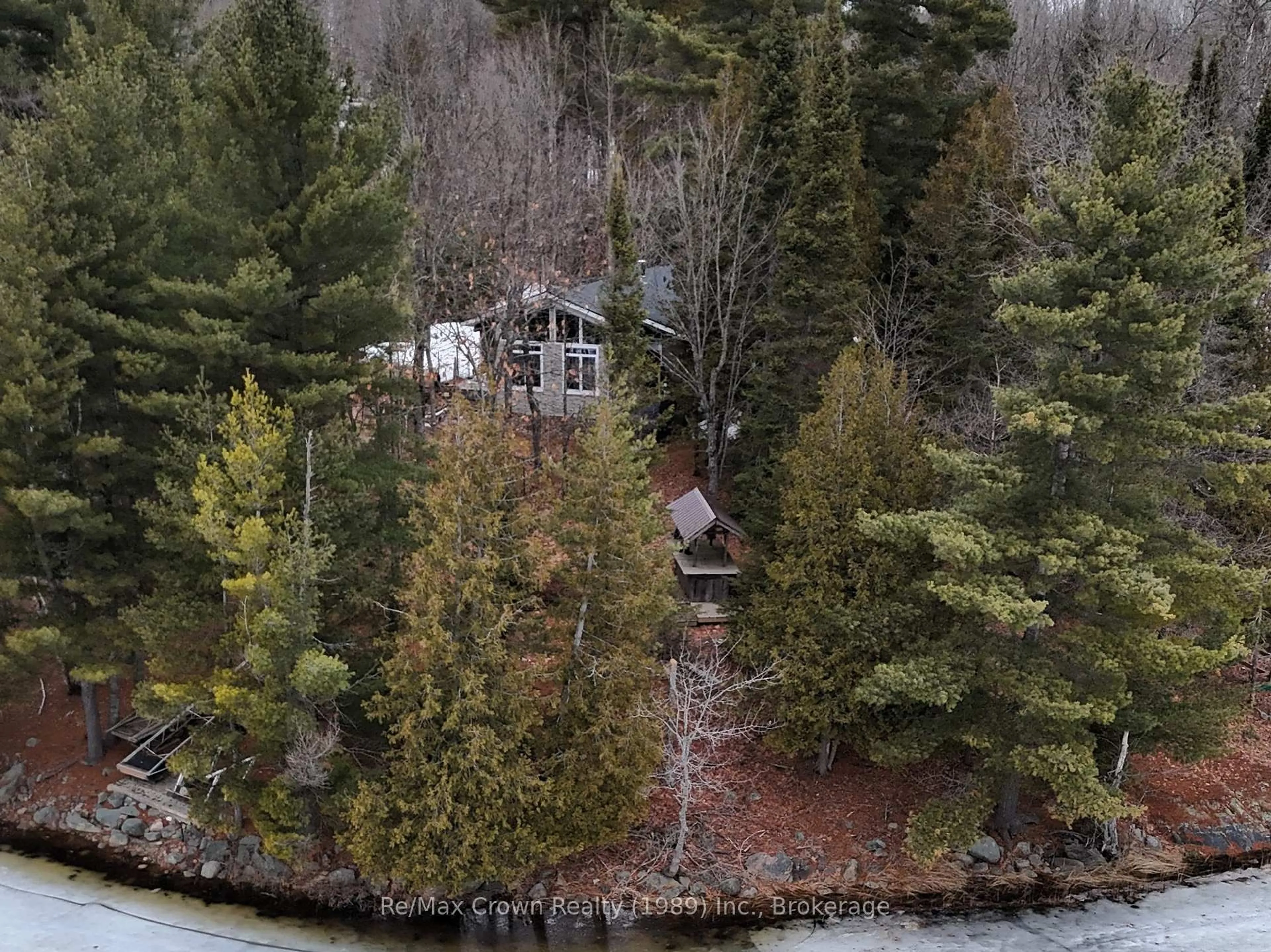 A pic from outside/outdoor area/front of a property/back of a property/a pic from drone, water/lake/river/ocean view for 935 Limberlost Point Rd, Parry Sound Remote Area Ontario P0H 2R0