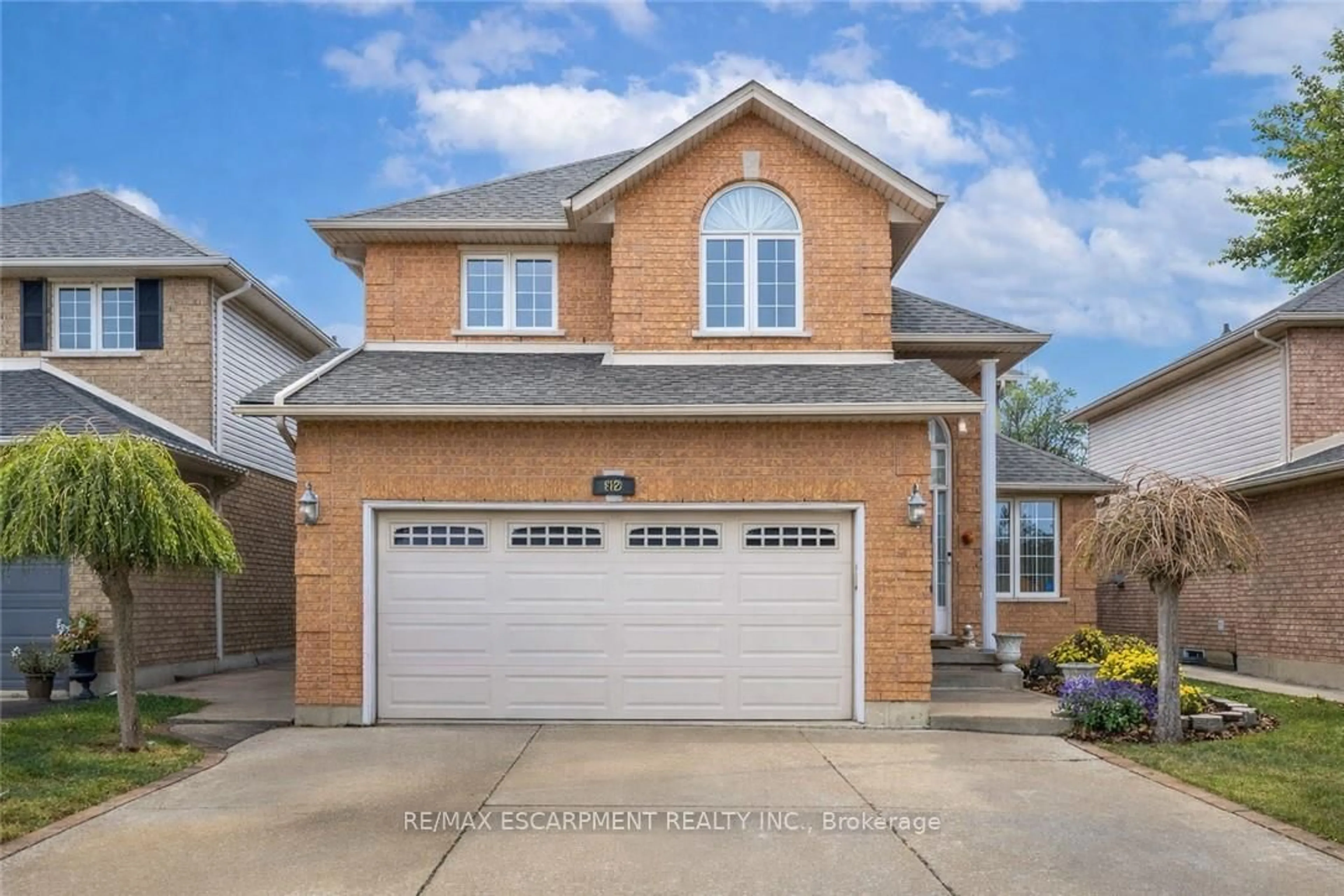 Home with brick exterior material, street for 42 Hillgarden Dr, Hamilton Ontario L8J 3R3