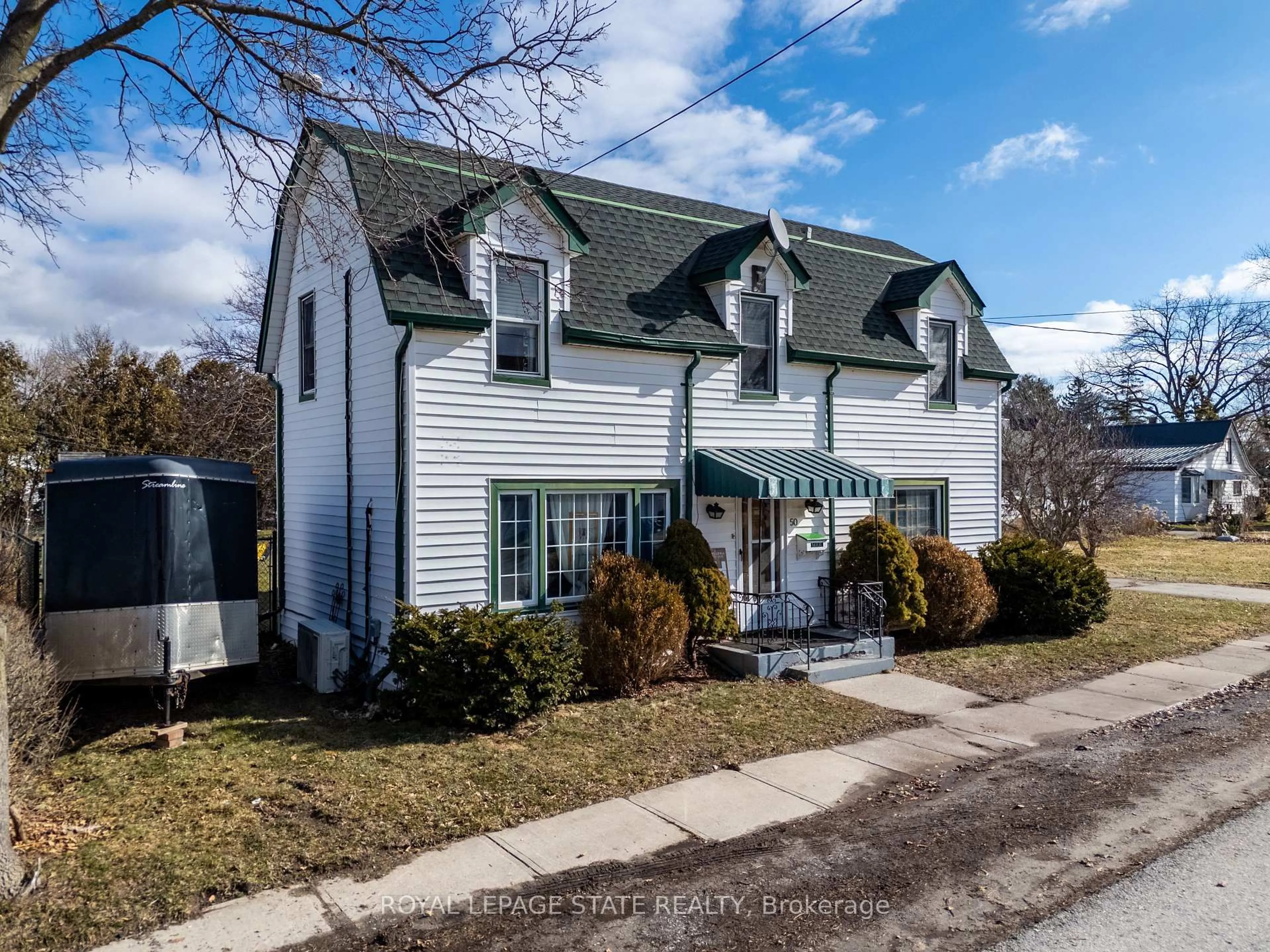 Home with vinyl exterior material, street for 50 Jane St, Haldimand Ontario N0A 1H0