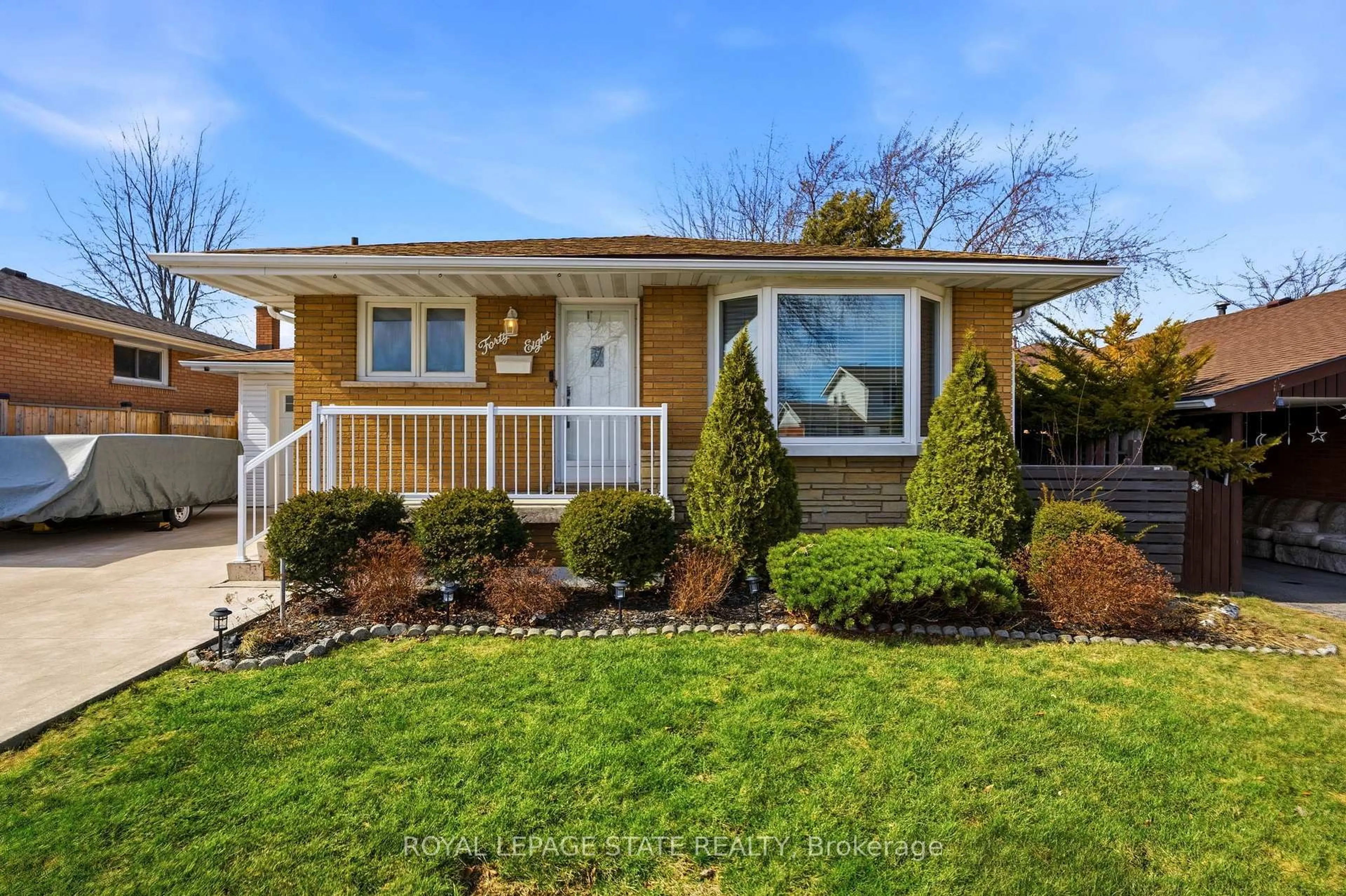 Home with vinyl exterior material, street for 48 Champlain Ave, Hamilton Ontario L8G 2H7