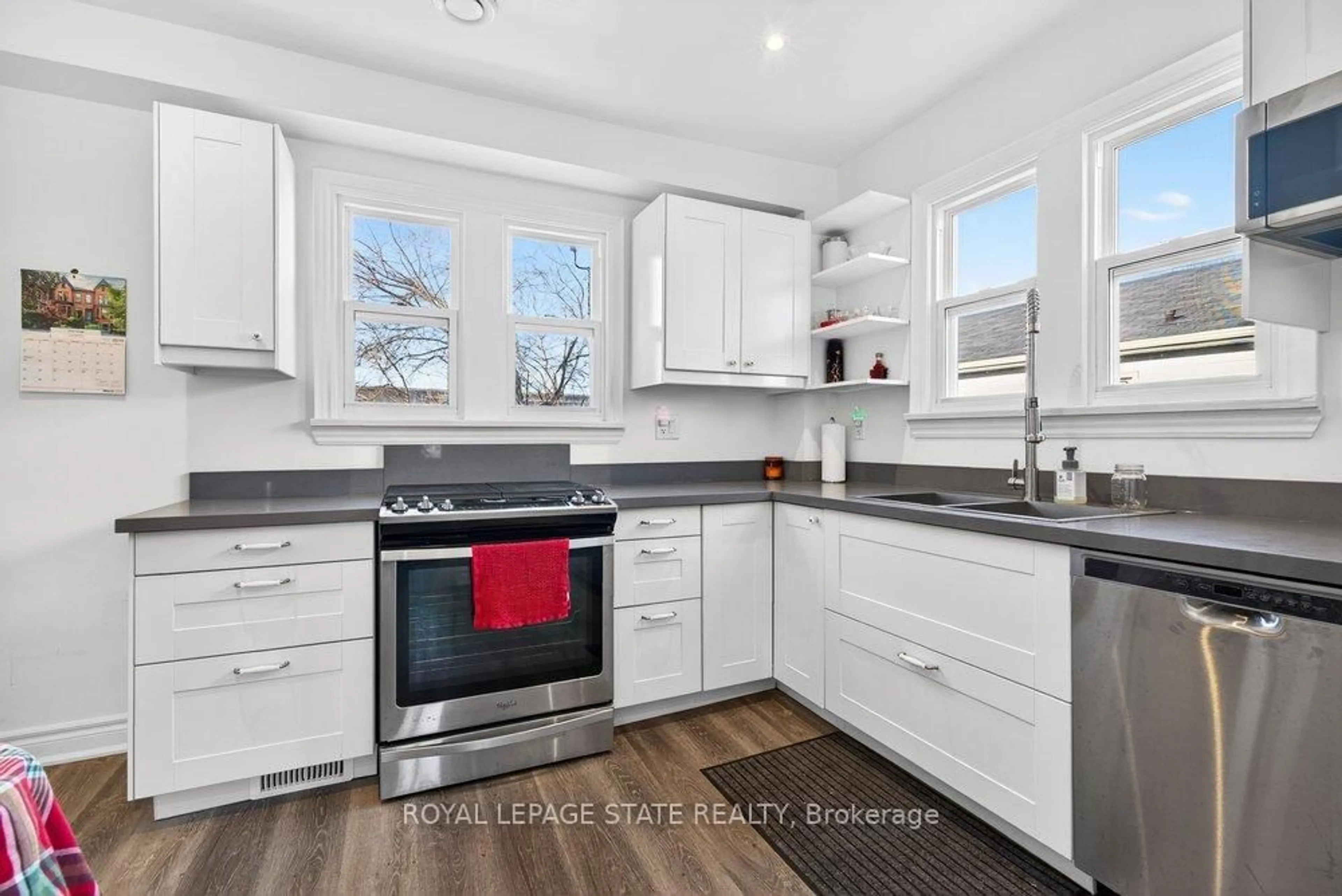 Open concept kitchen, ceramic/tile floor for 710 Rennie St, Hamilton Ontario L8H 3R2