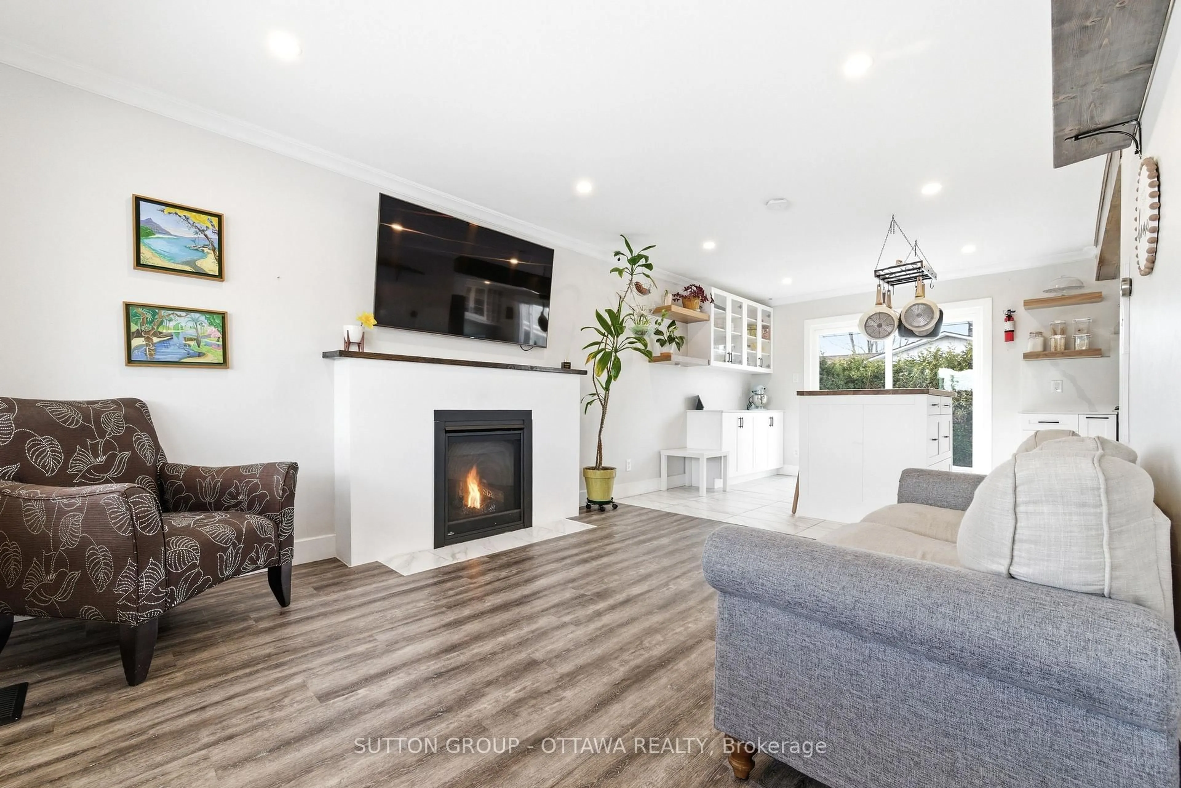 Living room with furniture, wood/laminate floor for 500 Aberdeen St, Renfrew Ontario K7V 2G9