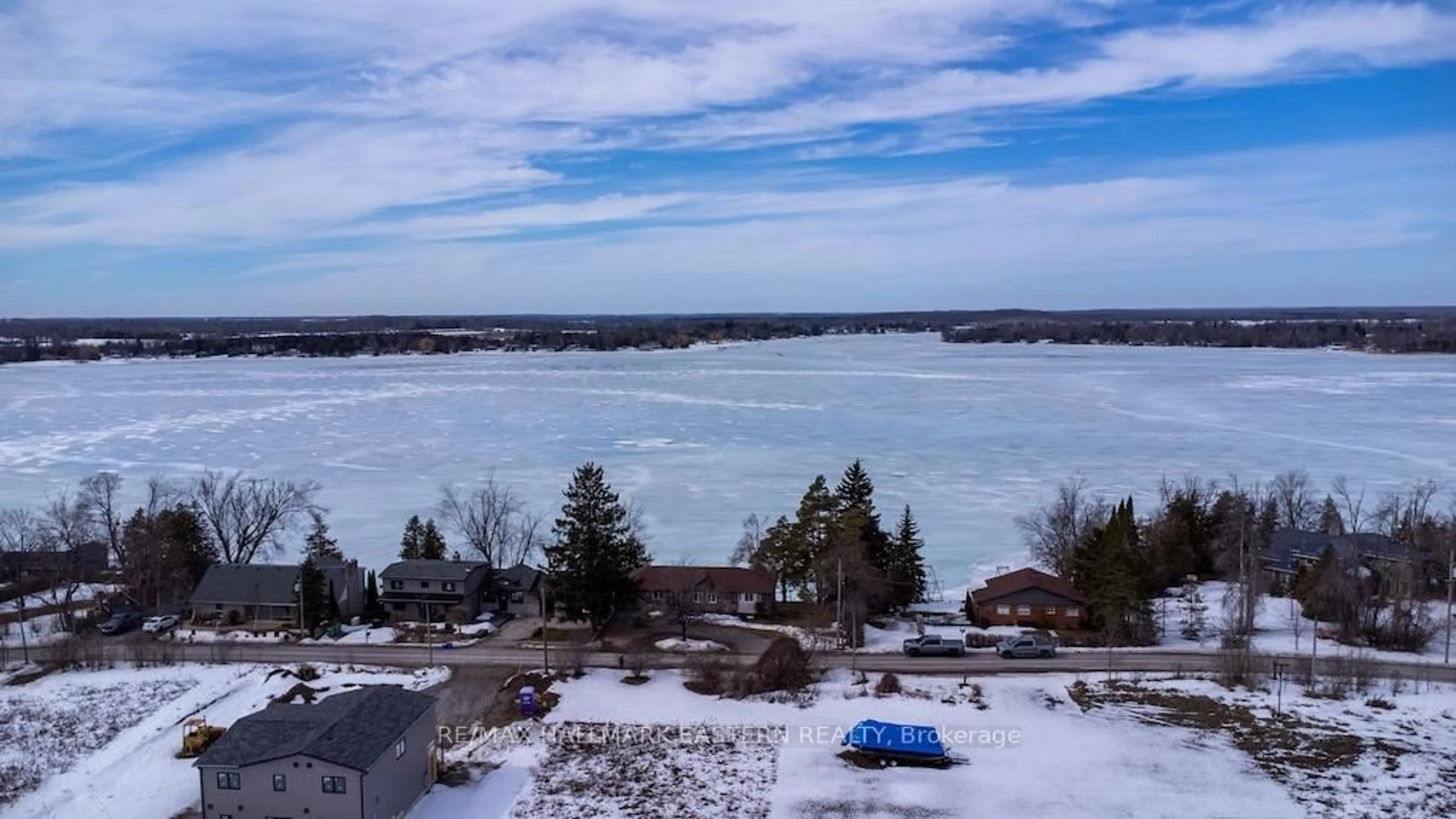 A pic from outside/outdoor area/front of a property/back of a property/a pic from drone, water/lake/river/ocean view for 1967 Pinehurst Ave, Selwyn Ontario K0L 2H0
