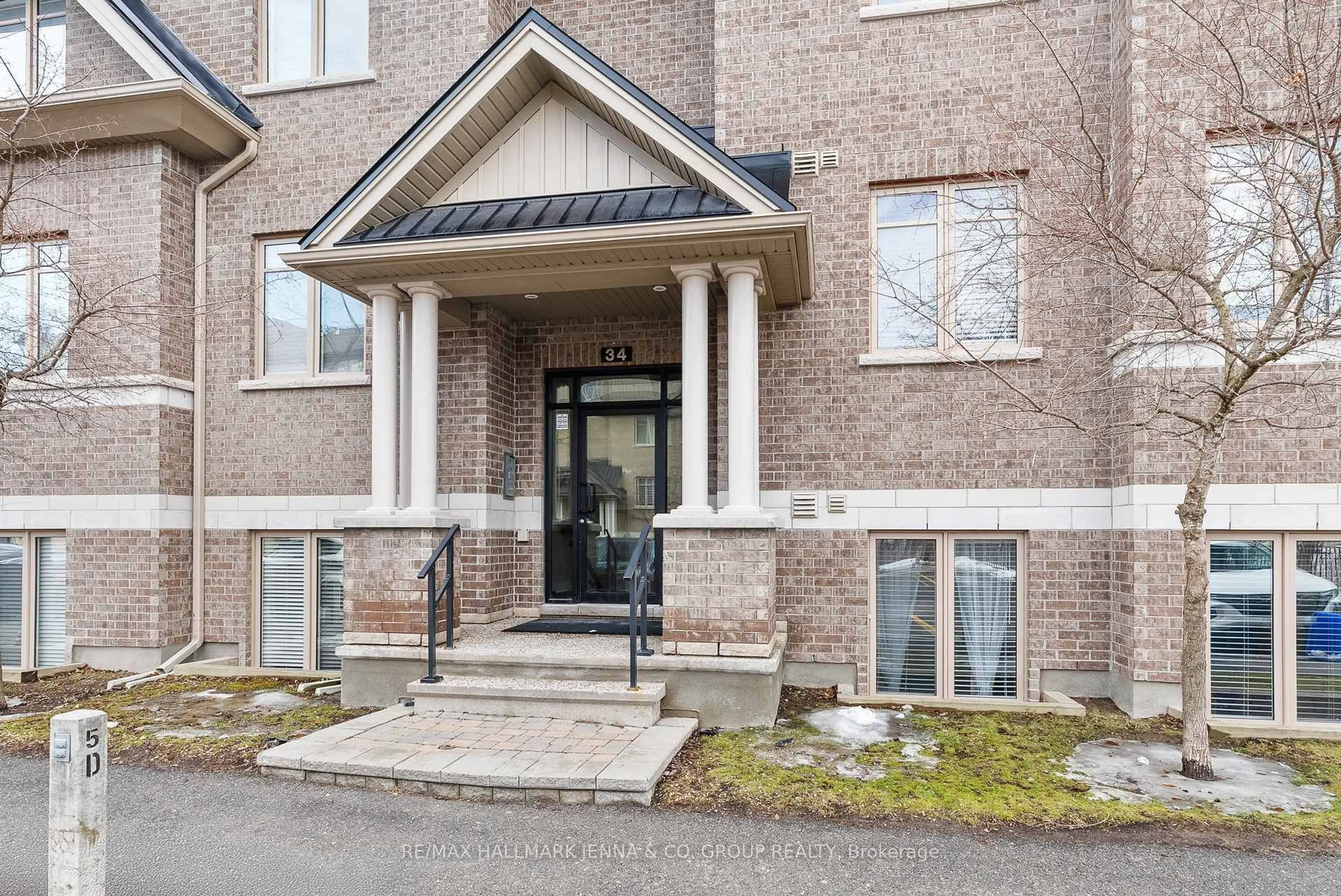 Home with brick exterior material, unknown for 34 Tadley Private #A, Ottawa Ontario K2J 2T3