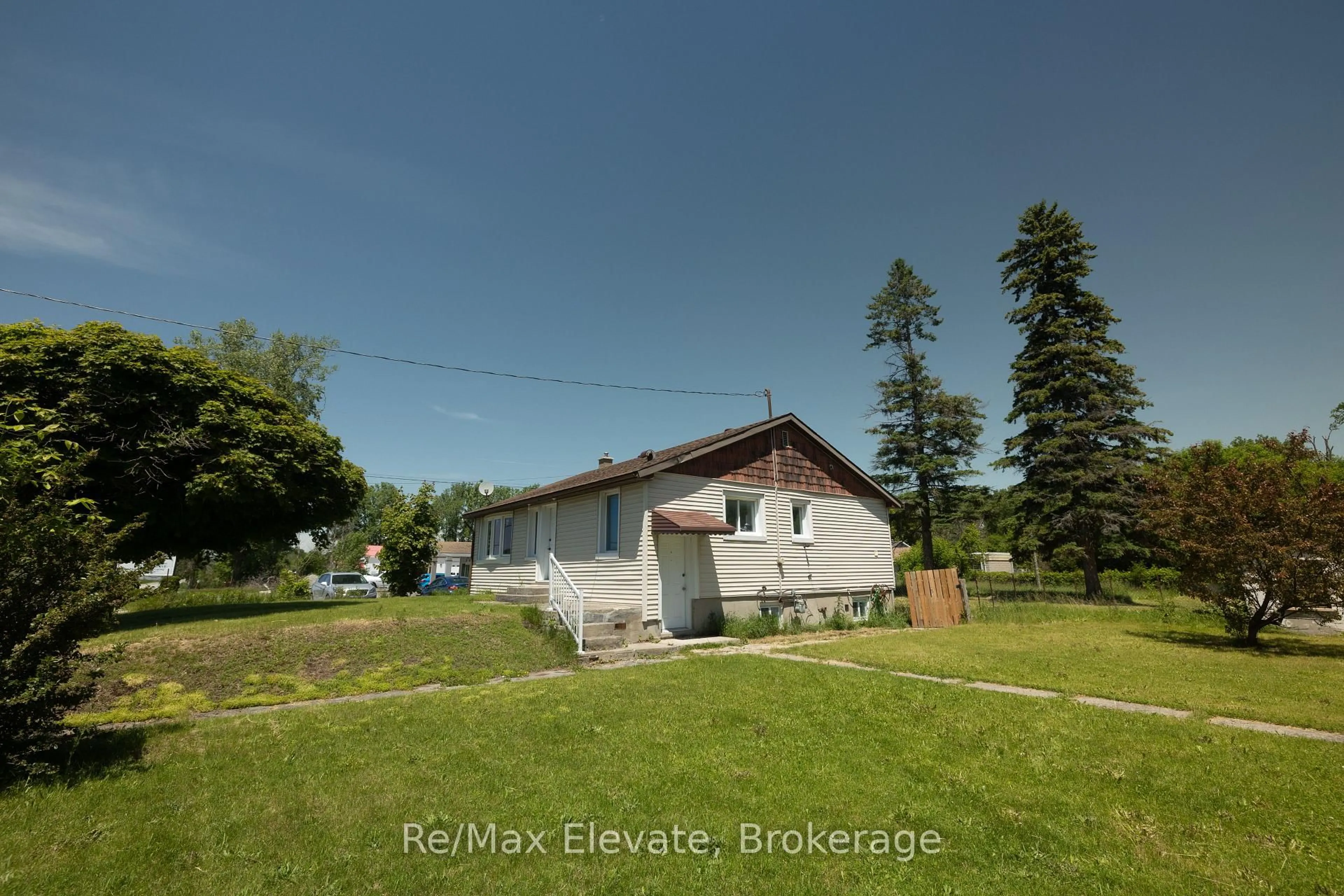 A pic from outside/outdoor area/front of a property/back of a property/a pic from drone, street for 106 Whites Rd, Quinte West Ontario K8V 5P5