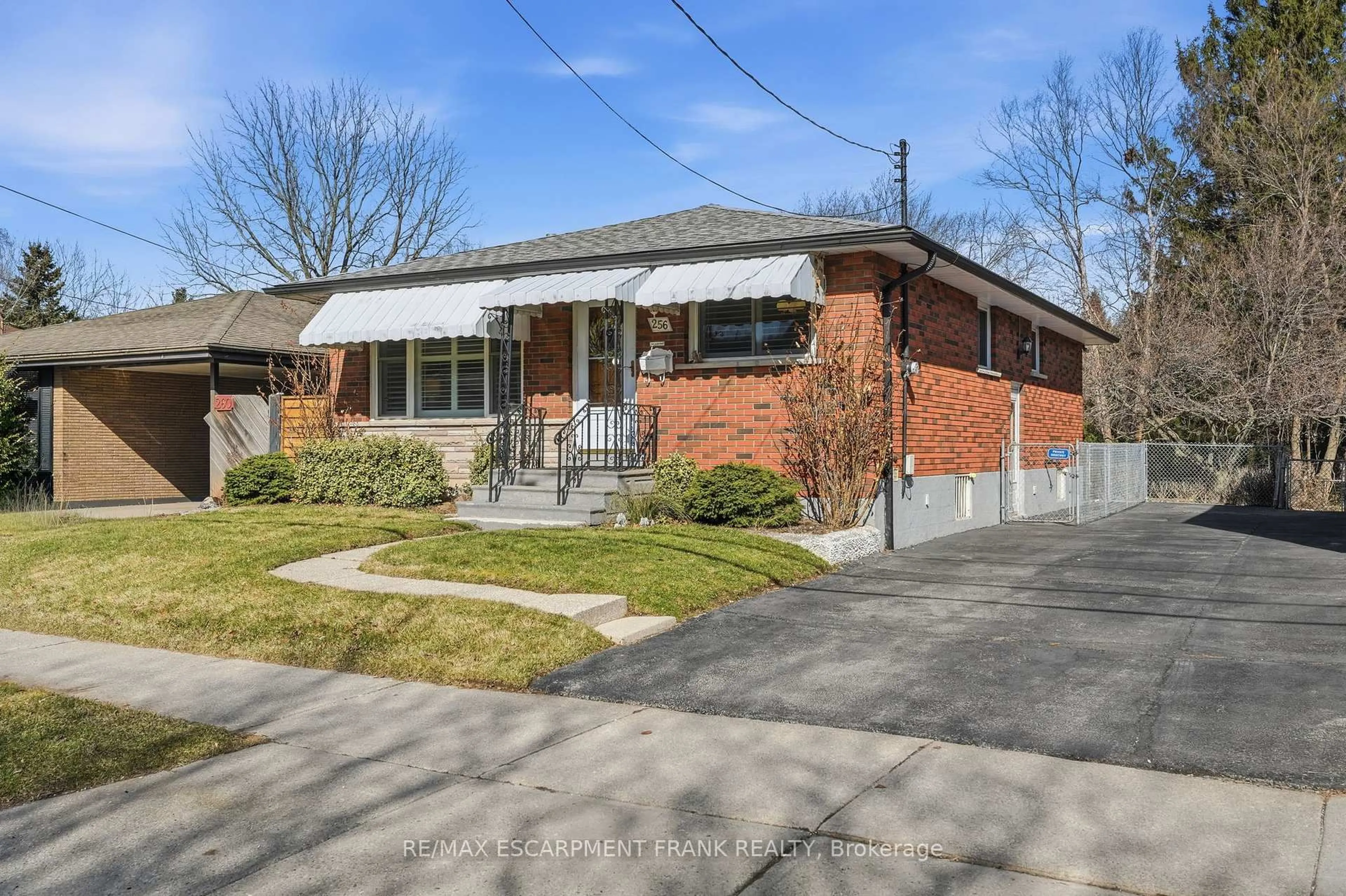 Home with brick exterior material, street for 256 Whitney Ave, Hamilton Ontario L8S 2G8