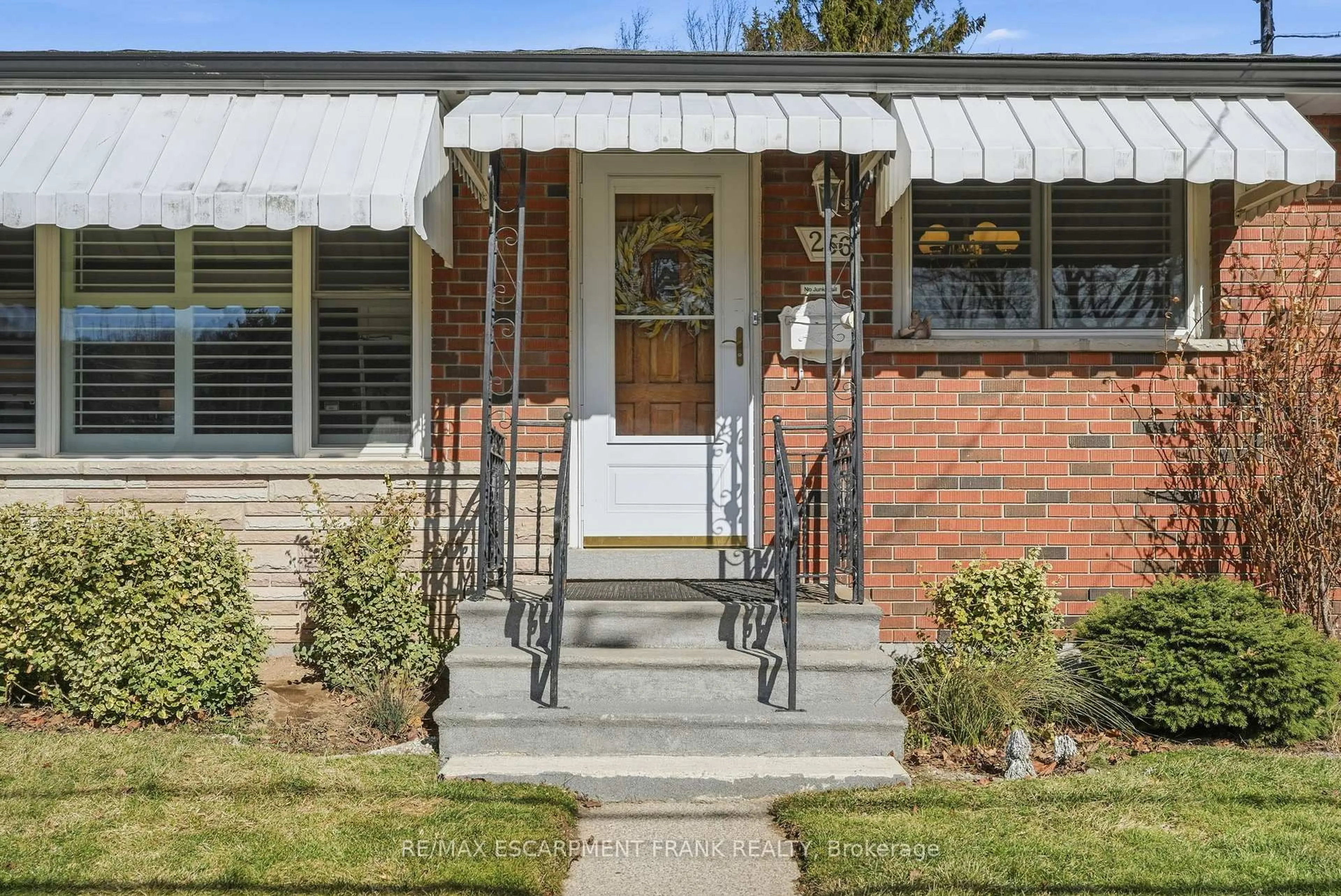 Home with brick exterior material, street for 256 Whitney Ave, Hamilton Ontario L8S 2G8