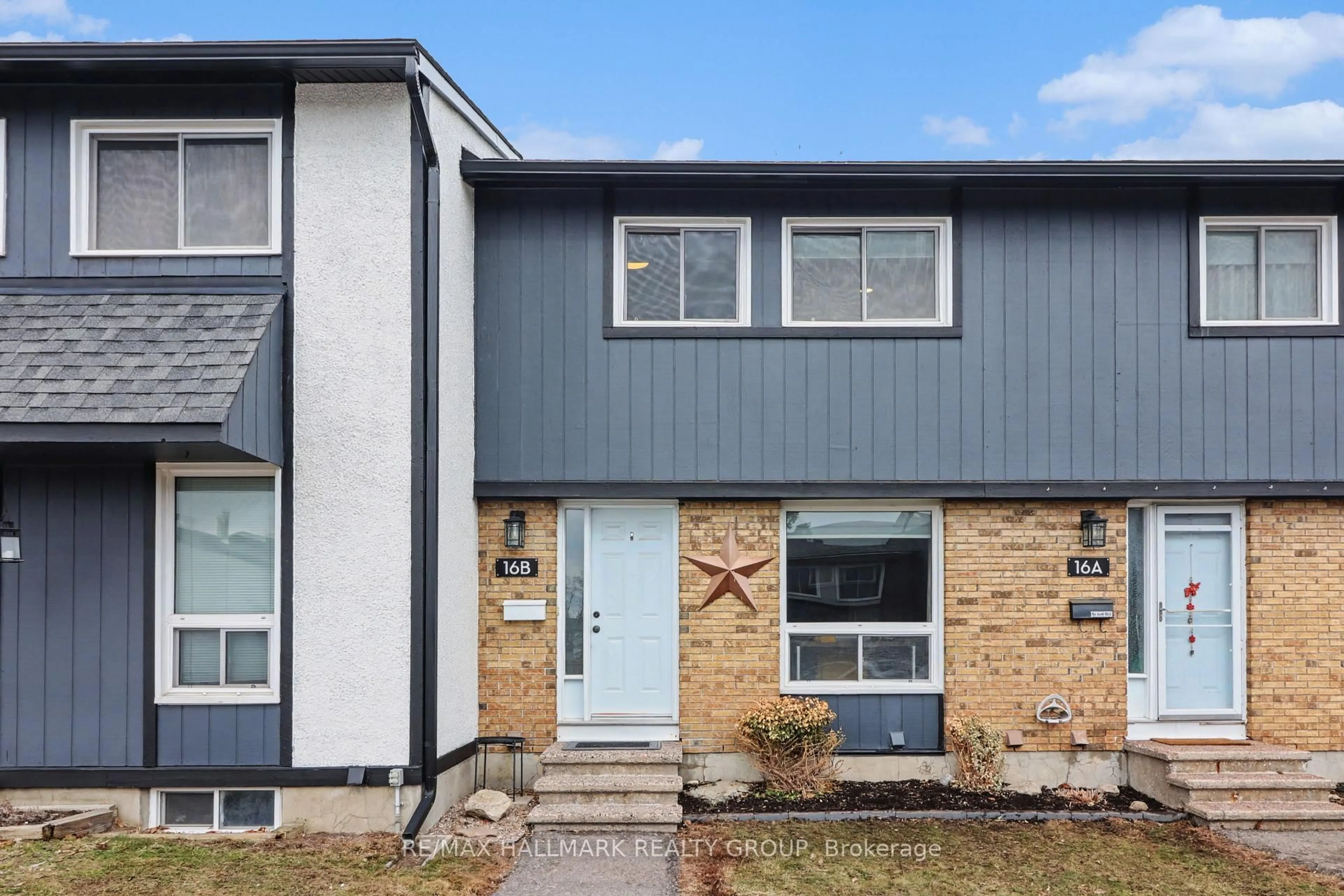 Home with vinyl exterior material, street for 16B Spring Grove Lane, Ottawa Ontario K2J 2C6