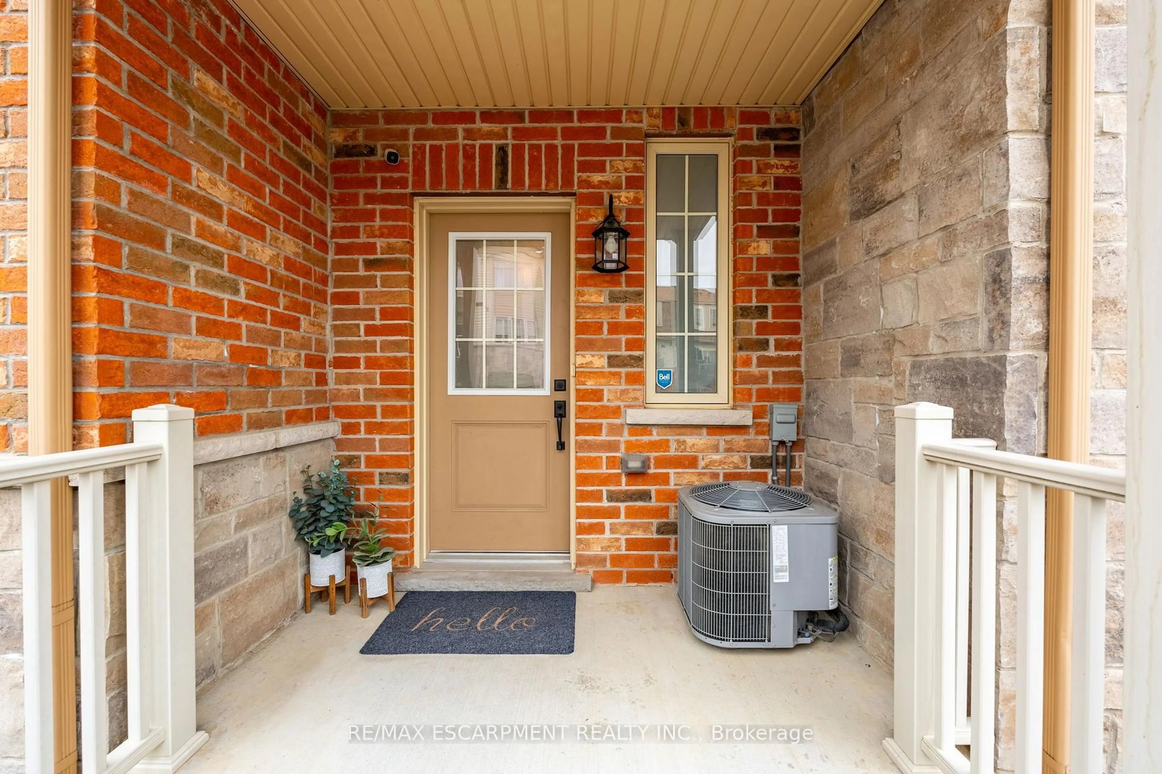 Home with brick exterior material, street for 11 Stockbridge Gdns #5, Hamilton Ontario L8J 0H5