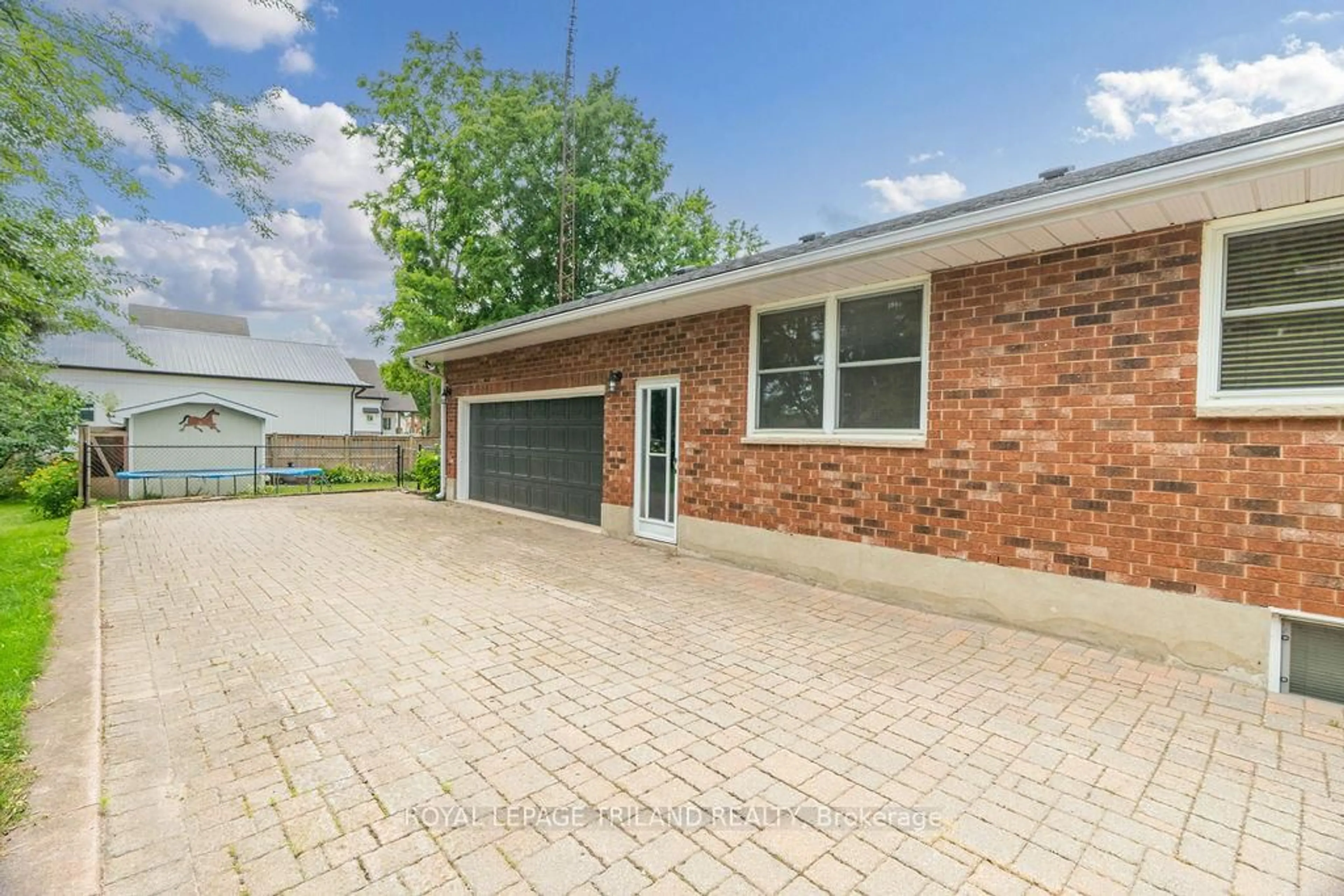 Home with brick exterior material, street for 1 Dugald St, Southwest Middlesex Ontario N0L 1A0