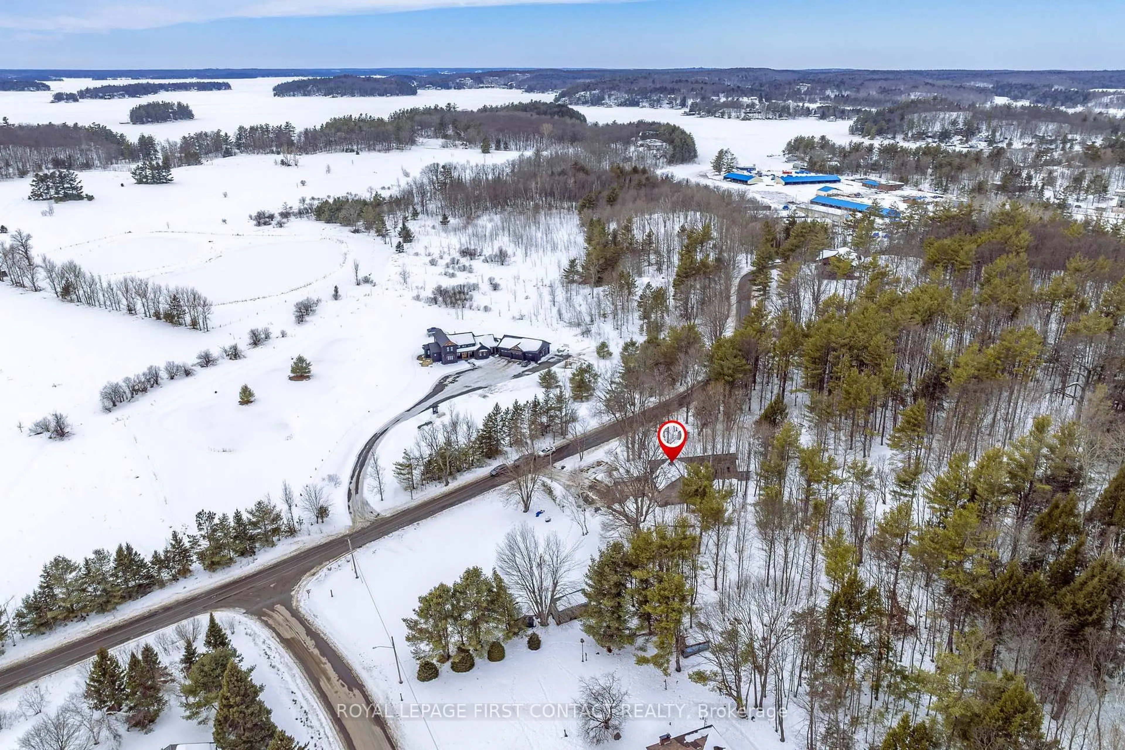 A pic from outside/outdoor area/front of a property/back of a property/a pic from drone, forest/trees view for 1073 Cedar Beach Rd, Bracebridge Ontario P1L 1W8