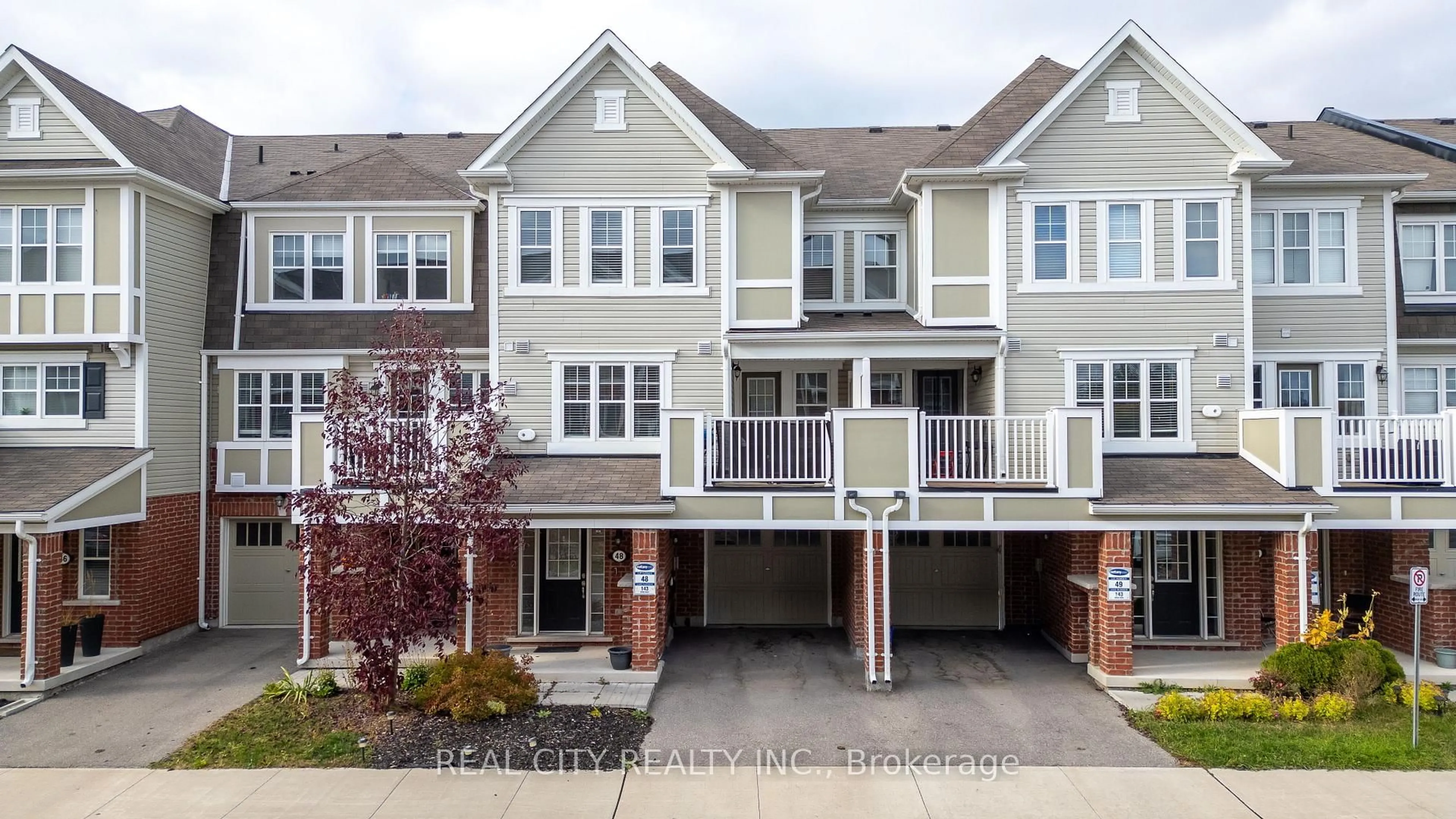 Home with vinyl exterior material, street for 143 Ridge Rd #48, Cambridge Ontario N3E 0E1