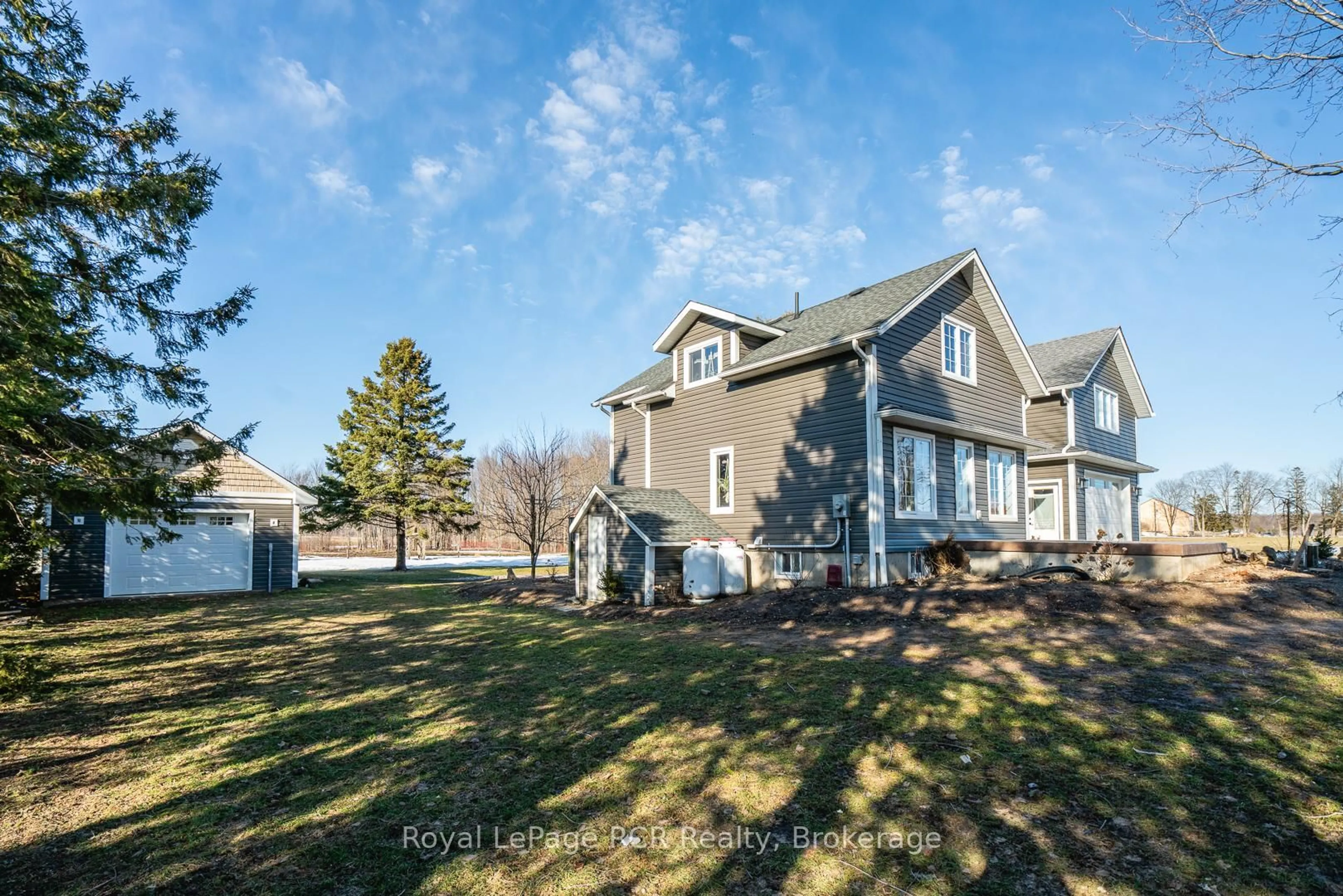 A pic from outside/outdoor area/front of a property/back of a property/a pic from drone, unknown for 6206 12th Line, Minto Ontario N0G 1Z0