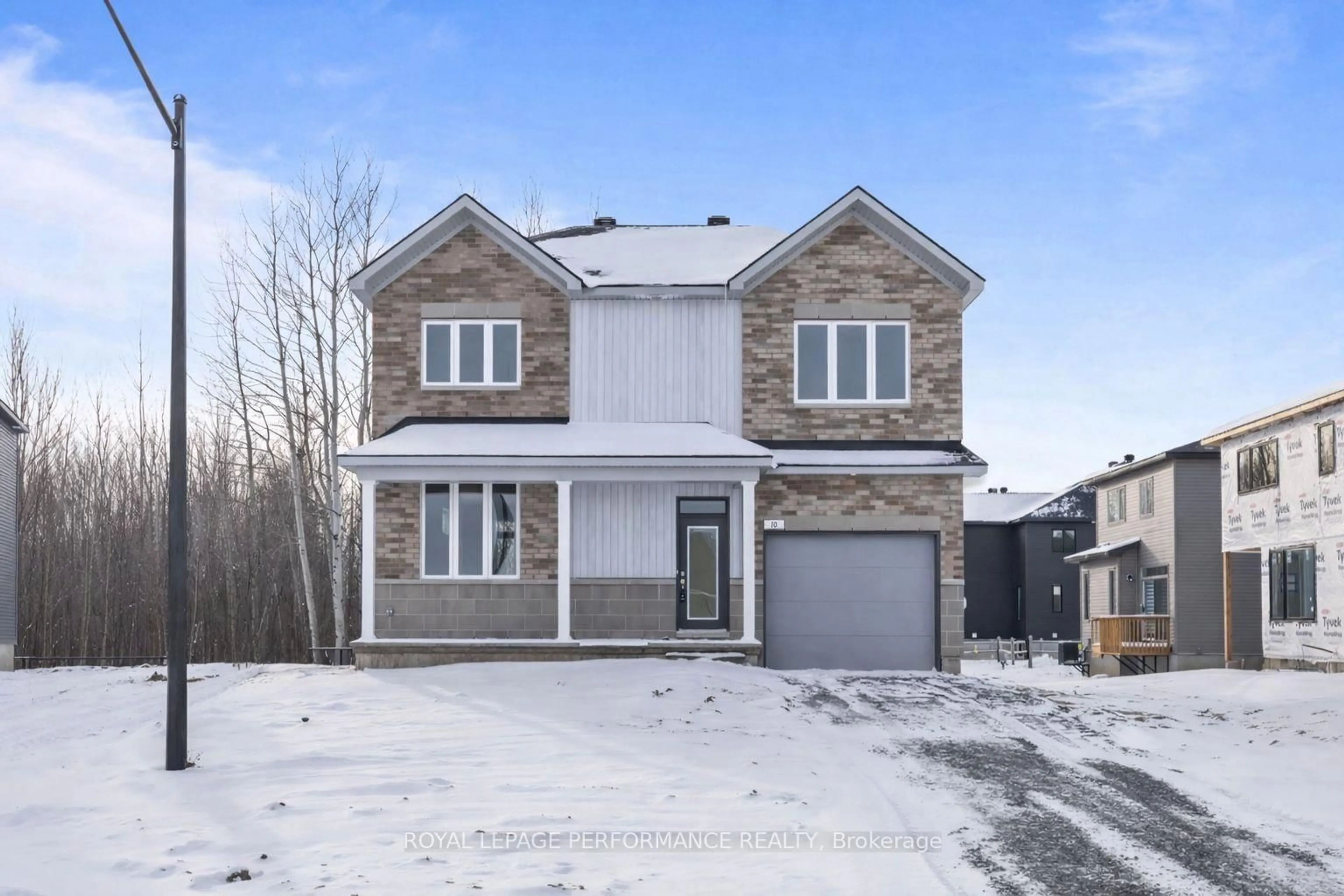 Home with brick exterior material, street for 10 Academie St, Russell Ontario K0A 1W0