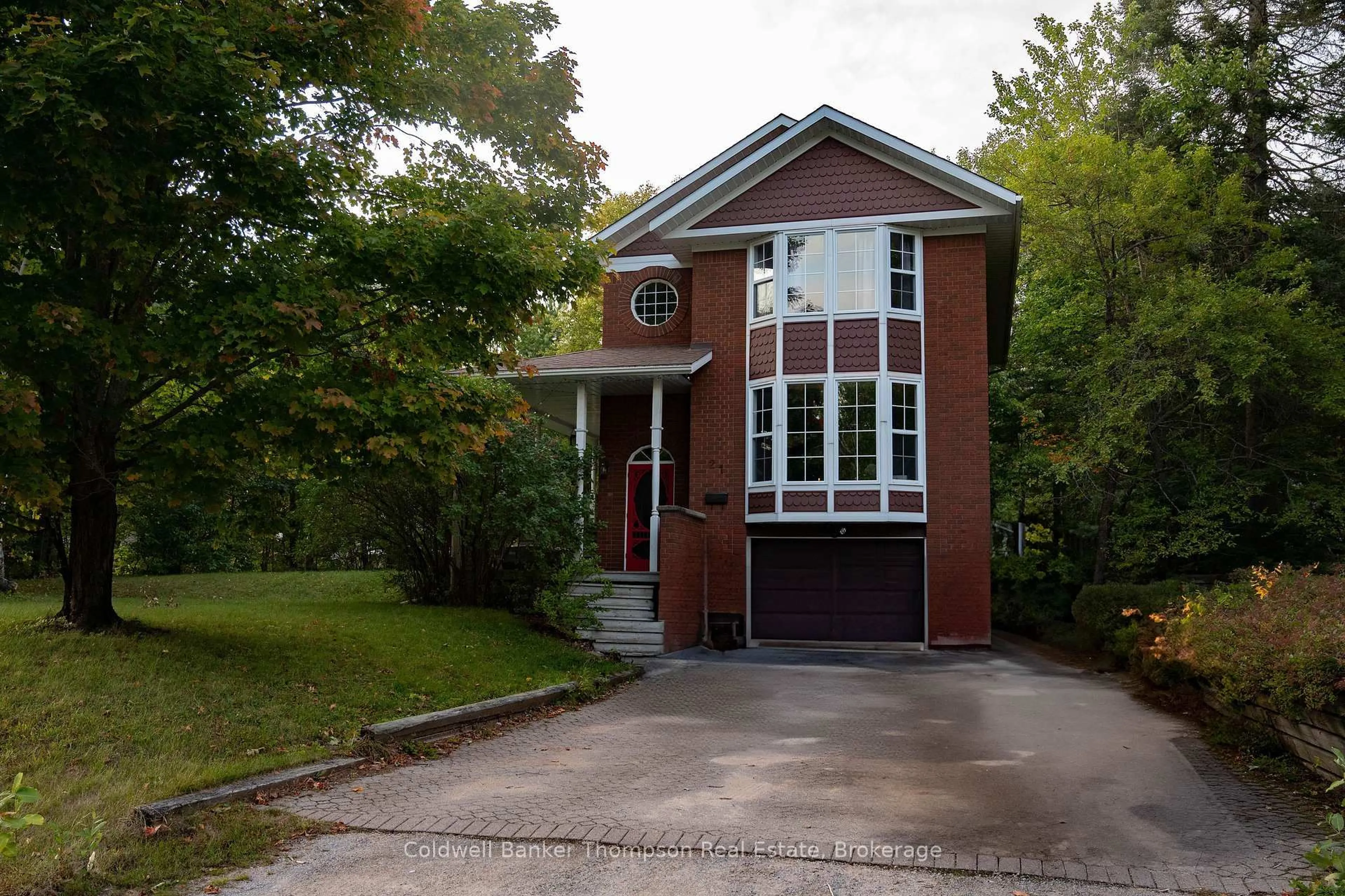 Home with brick exterior material, street for 21 Birchwood Dr, Sundridge Ontario P0A 1Z0