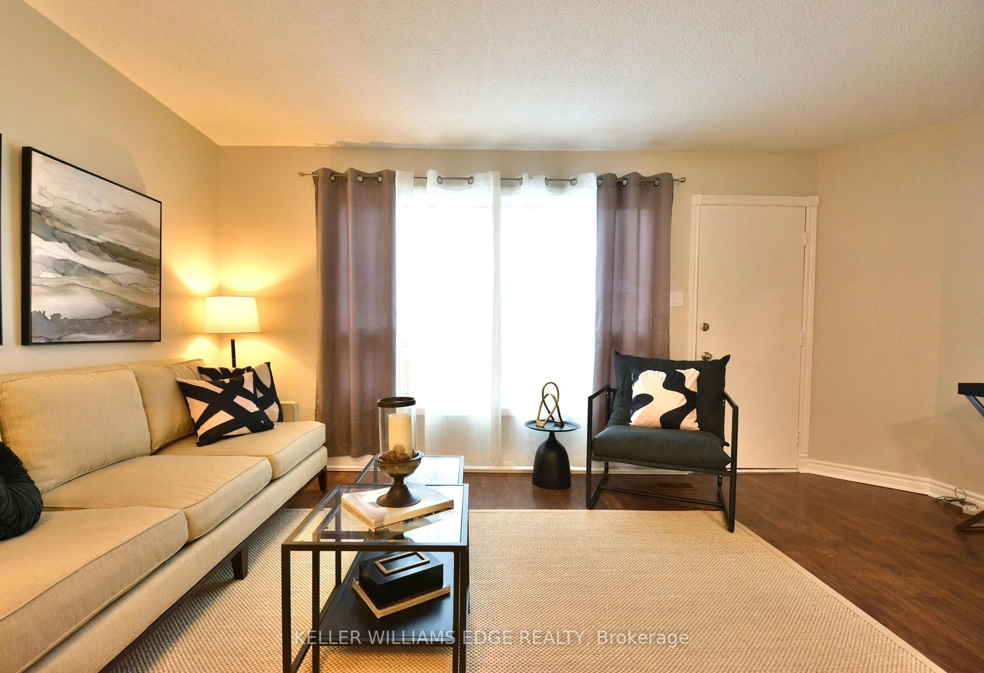 Living room with furniture, unknown for 120 Quigley Rd #5, Hamilton Ontario L8K 6L4