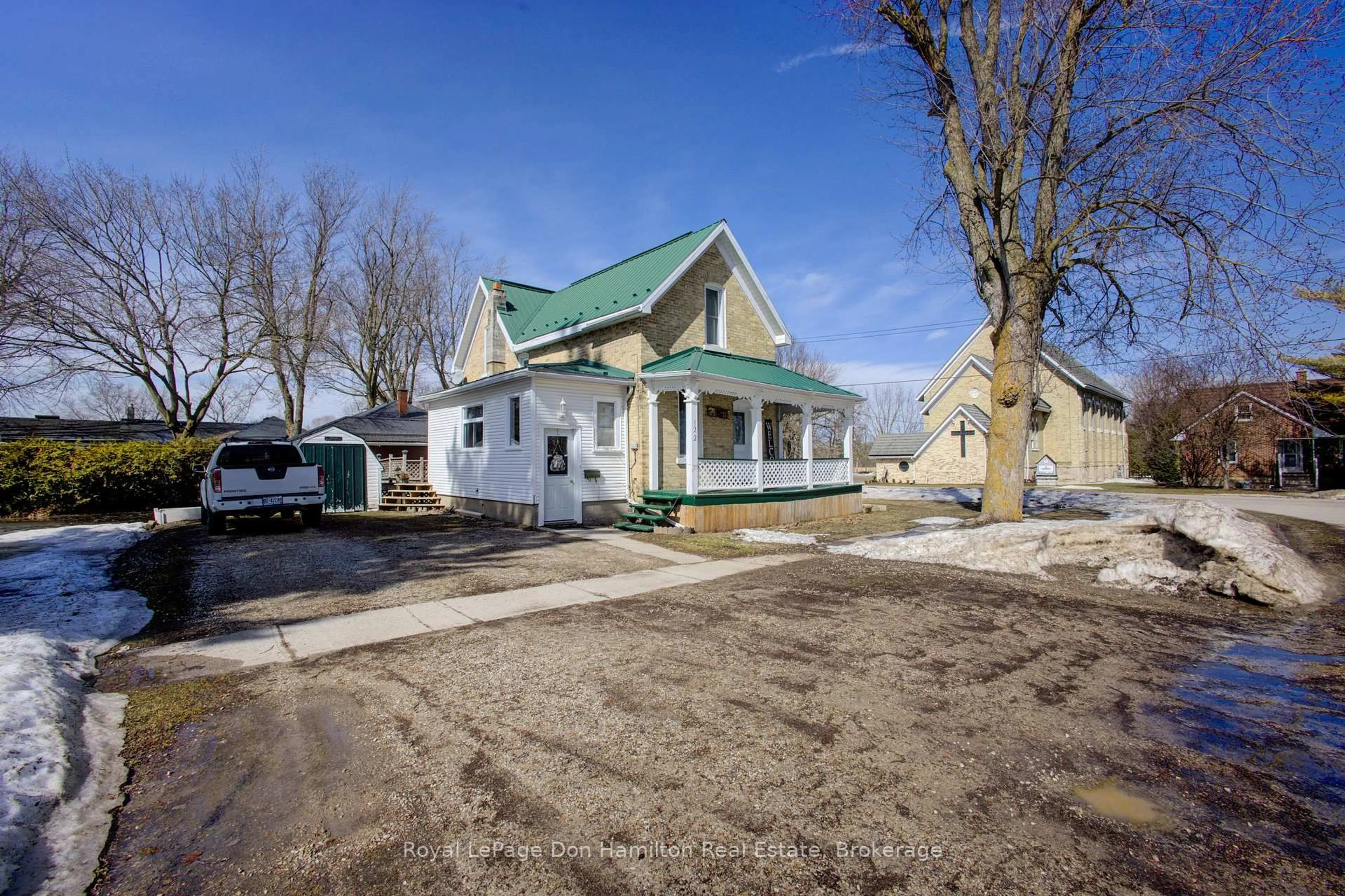 A pic from outside/outdoor area/front of a property/back of a property/a pic from drone, street for 122 King St, North Perth Ontario N0G 1B0