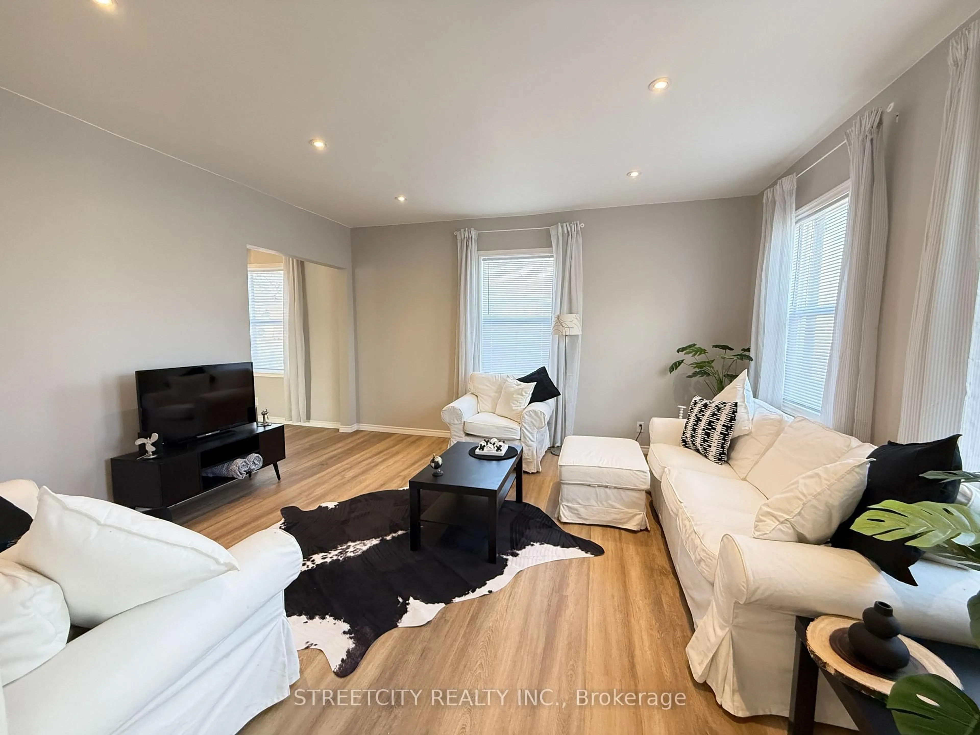 Living room with furniture, wood/laminate floor for 2593 DURYEE St, Oil Springs Ontario N0N 1P0