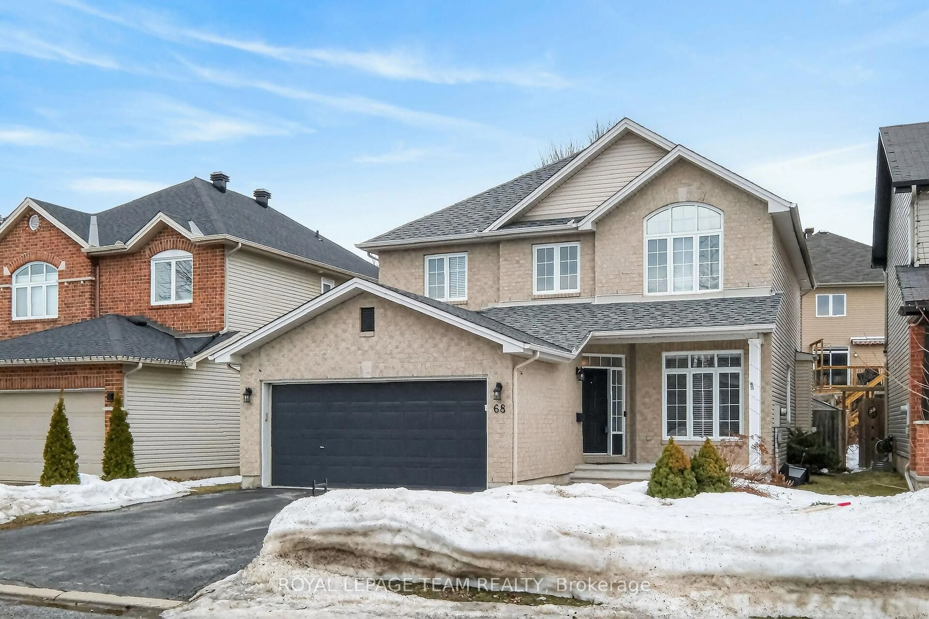 Home with brick exterior material, street for 68 Polo Lane, Ottawa Ontario K2M 2Y4