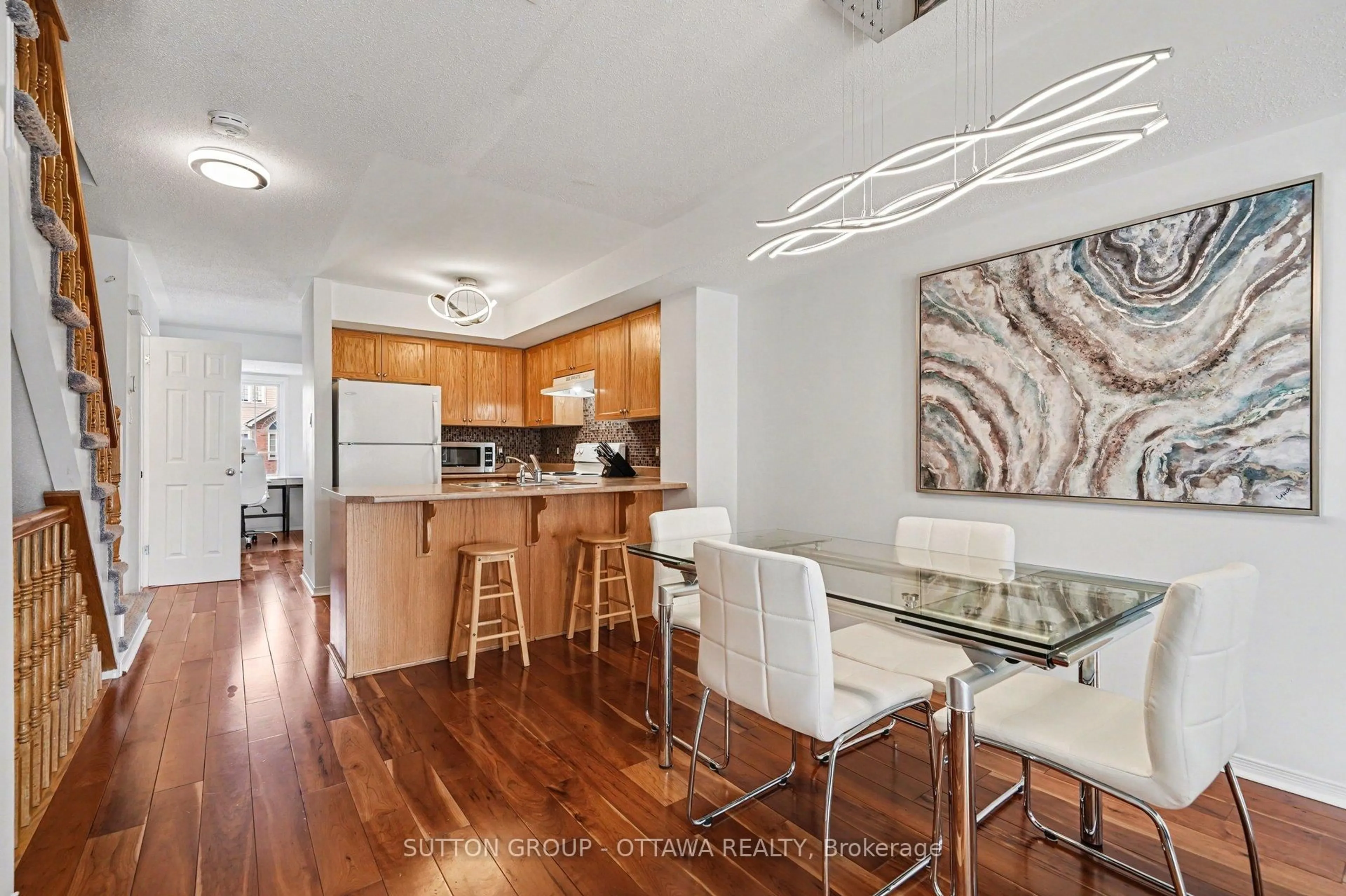 Open concept kitchen, wood/laminate floor for 56 Steele Park Private, Ottawa Ontario K1J 0J2