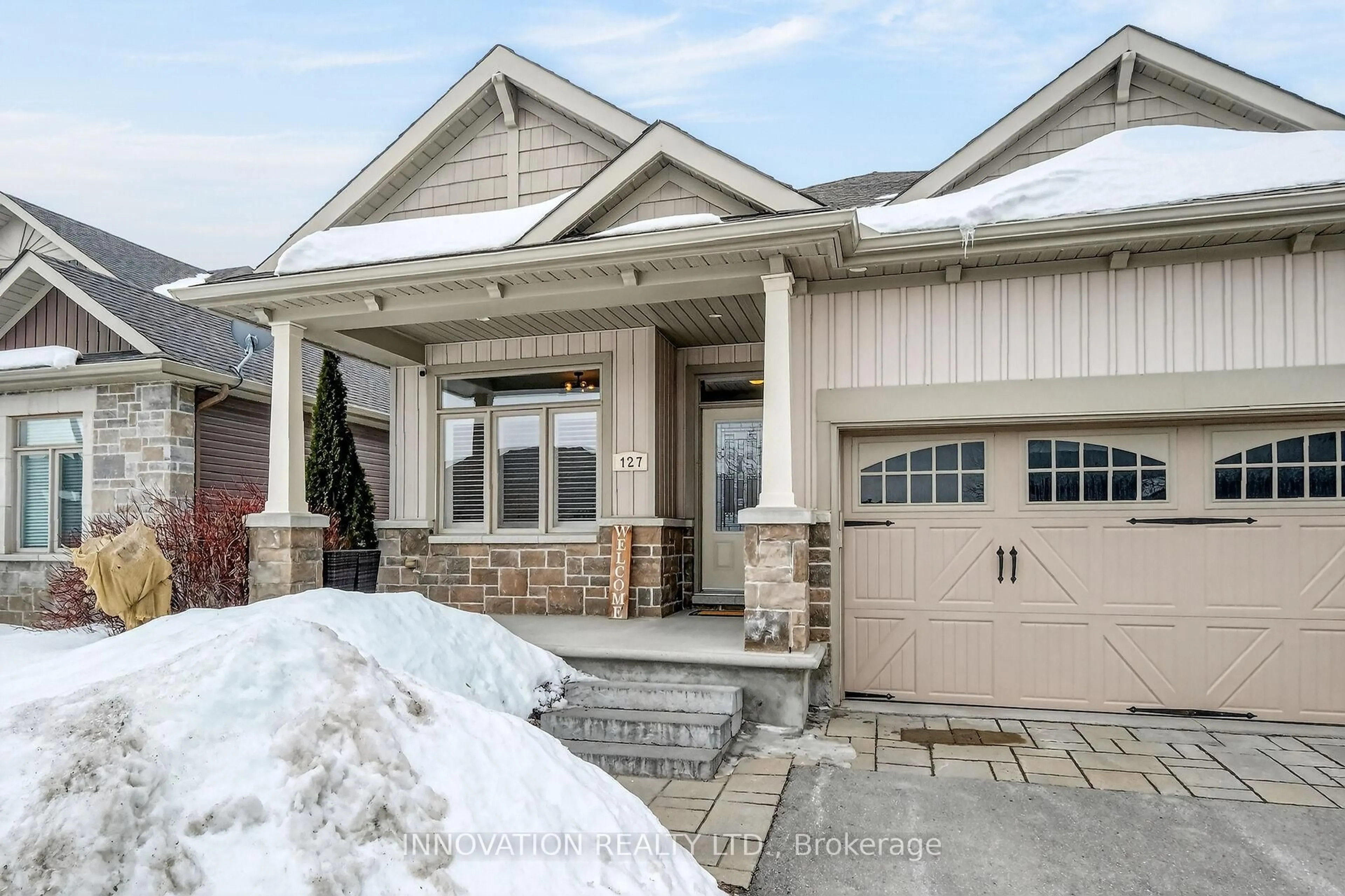 Home with brick exterior material, street for 127 Elfin Grve, Ottawa Ontario K2V 0B9
