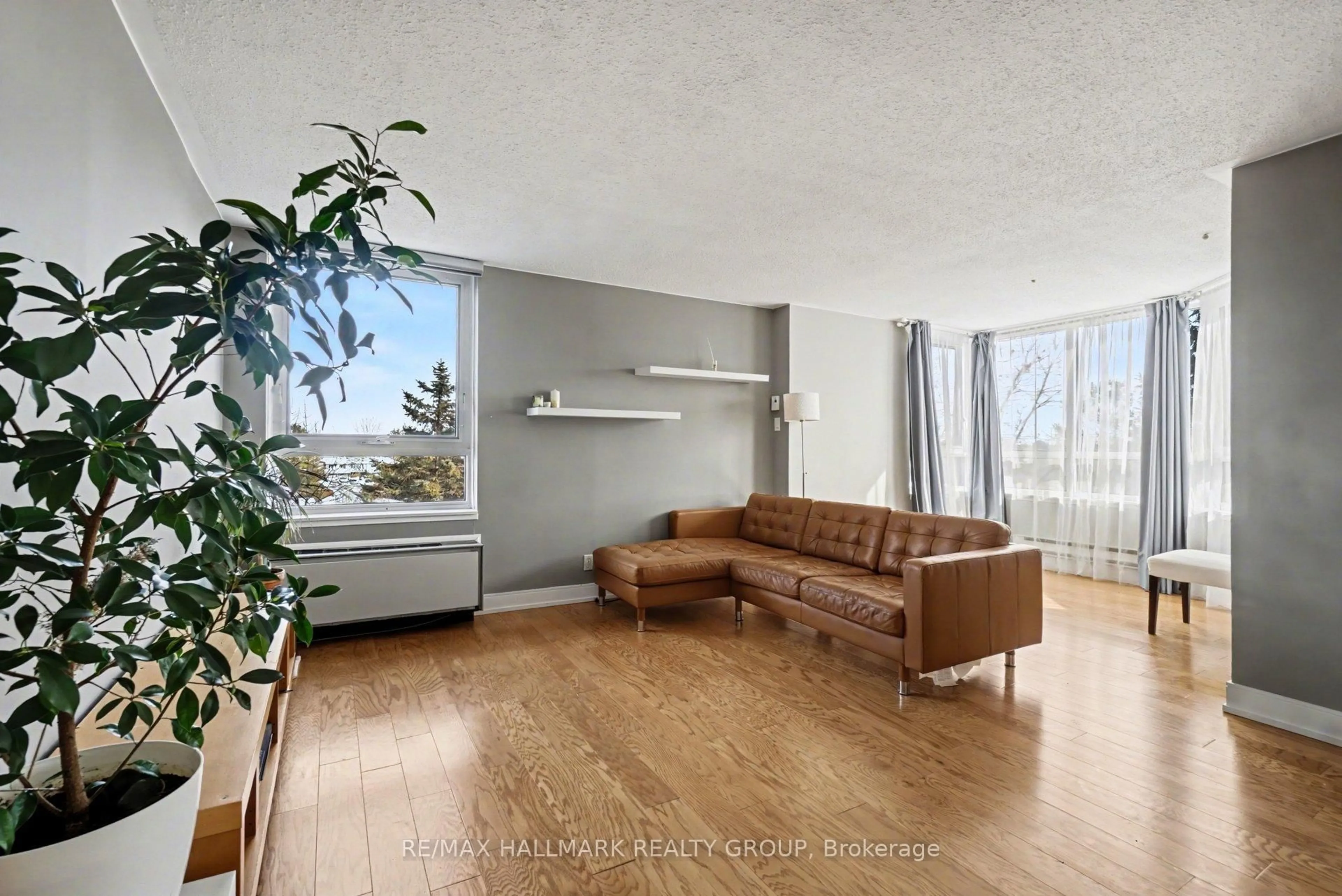 Living room with furniture, unknown for 80 Sandcastle Dr #616, Ottawa Ontario K2H 9E7