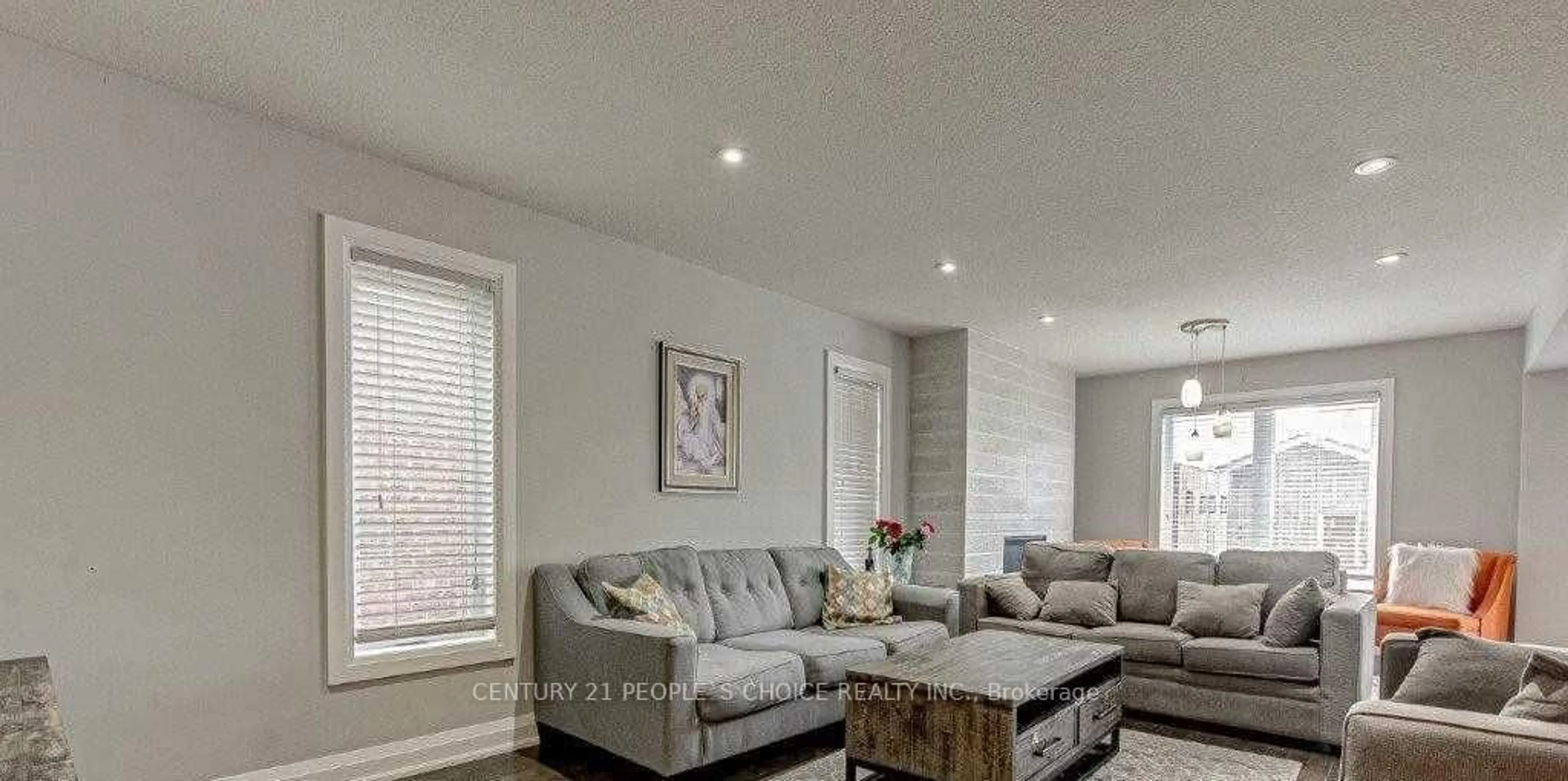 Living room with furniture, wood/laminate floor for 1880 Sedgefield Row, London North Ontario N6G 0P8