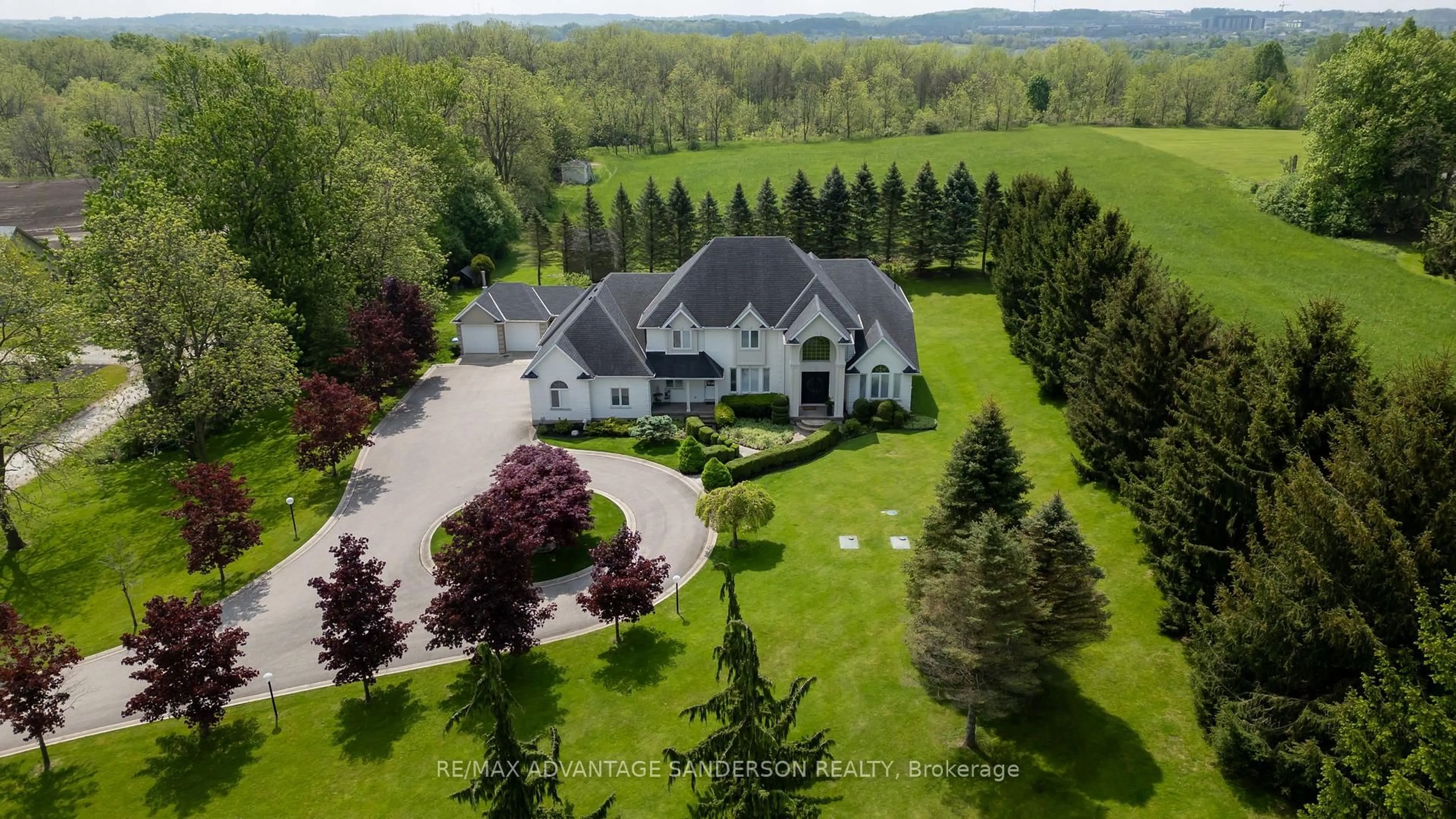 A pic from outside/outdoor area/front of a property/back of a property/a pic from drone, mountain view for 20735 Denfield Rd, London North Ontario N6H 5L2