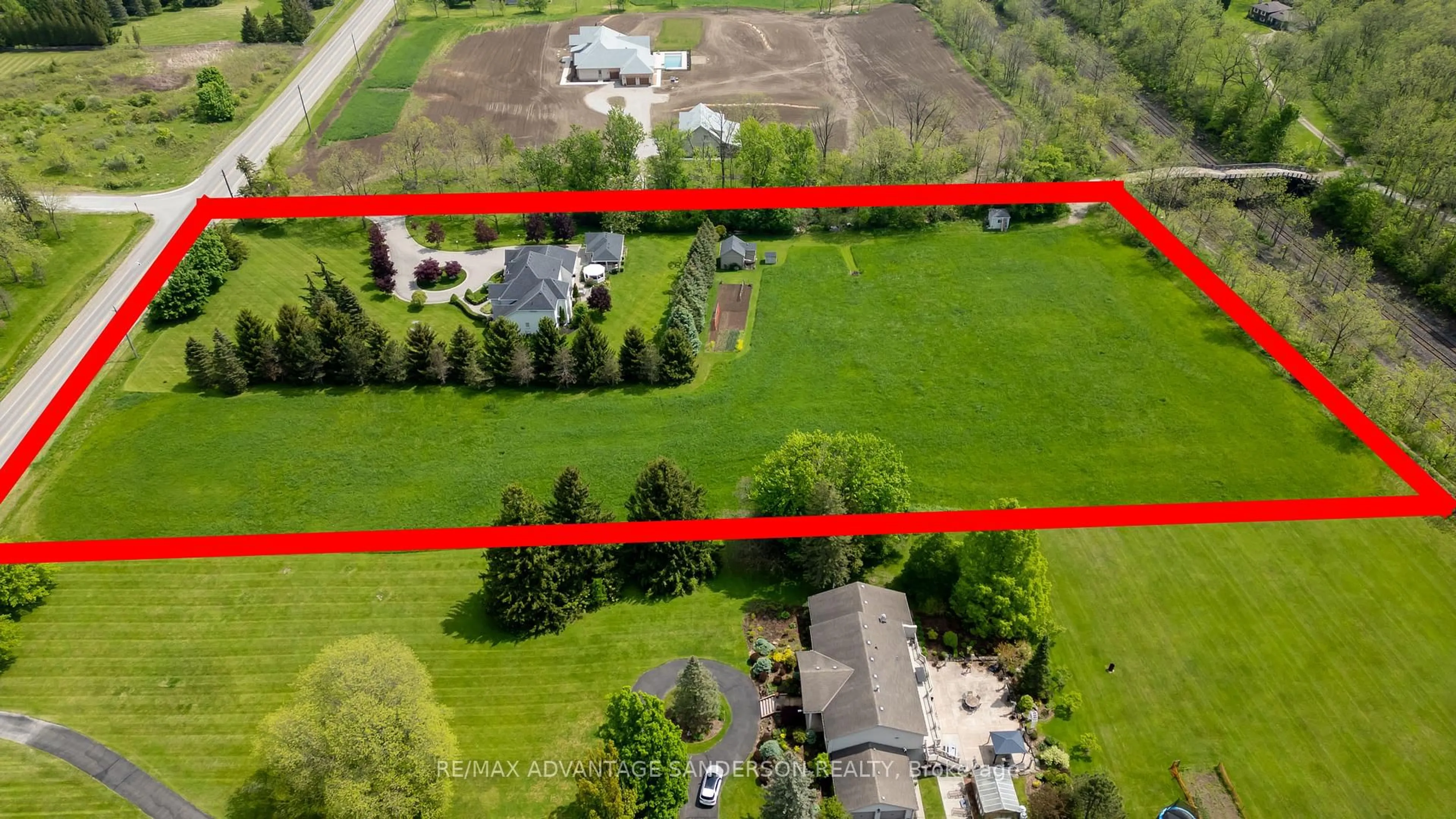 A pic from outside/outdoor area/front of a property/back of a property/a pic from drone, street for 20735 Denfield Rd, London North Ontario N6H 5L2