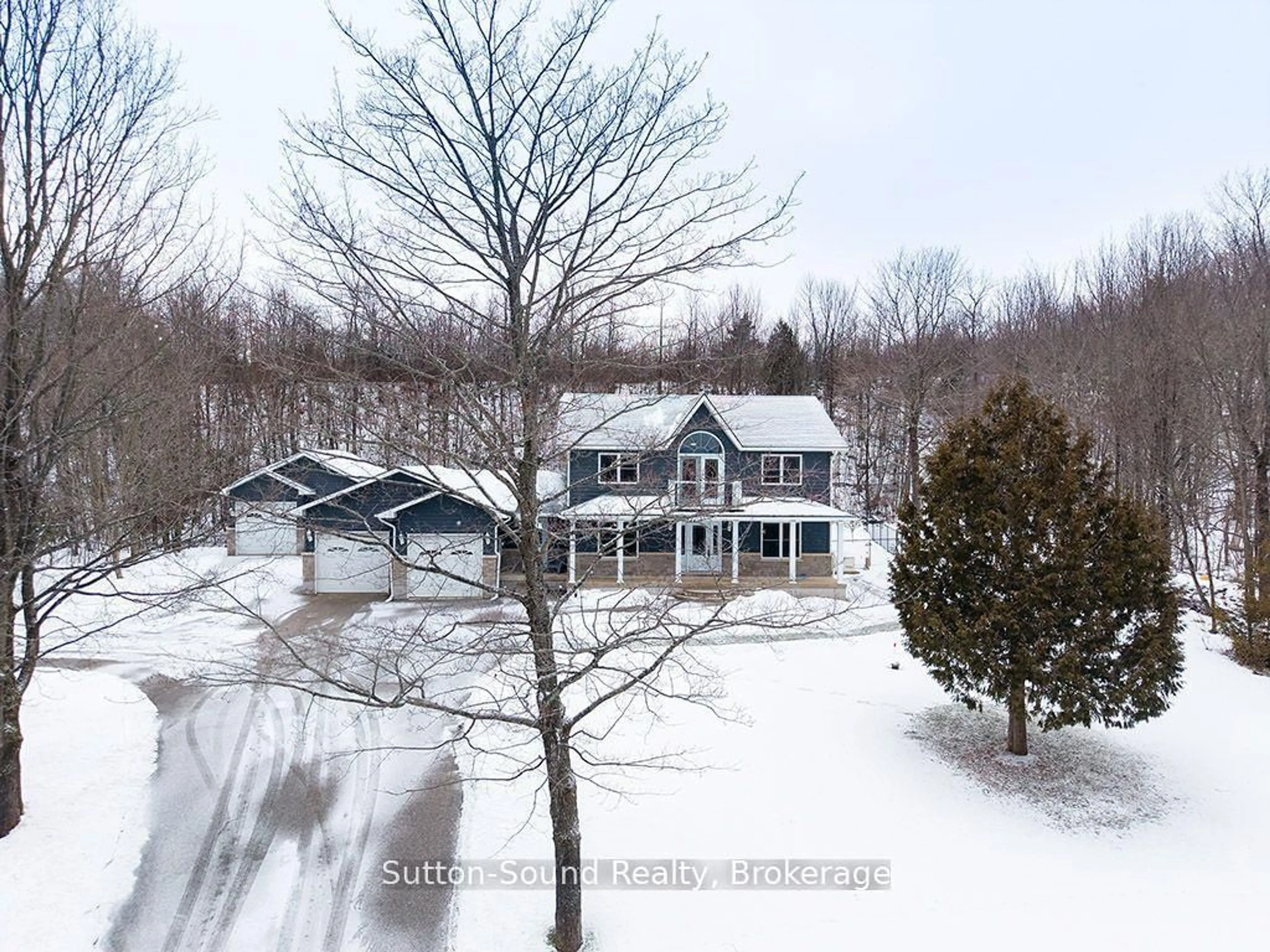 A pic from outside/outdoor area/front of a property/back of a property/a pic from drone, unknown for 505396 Grey Road 1 Rd, Georgian Bluffs Ontario N0H 2T0