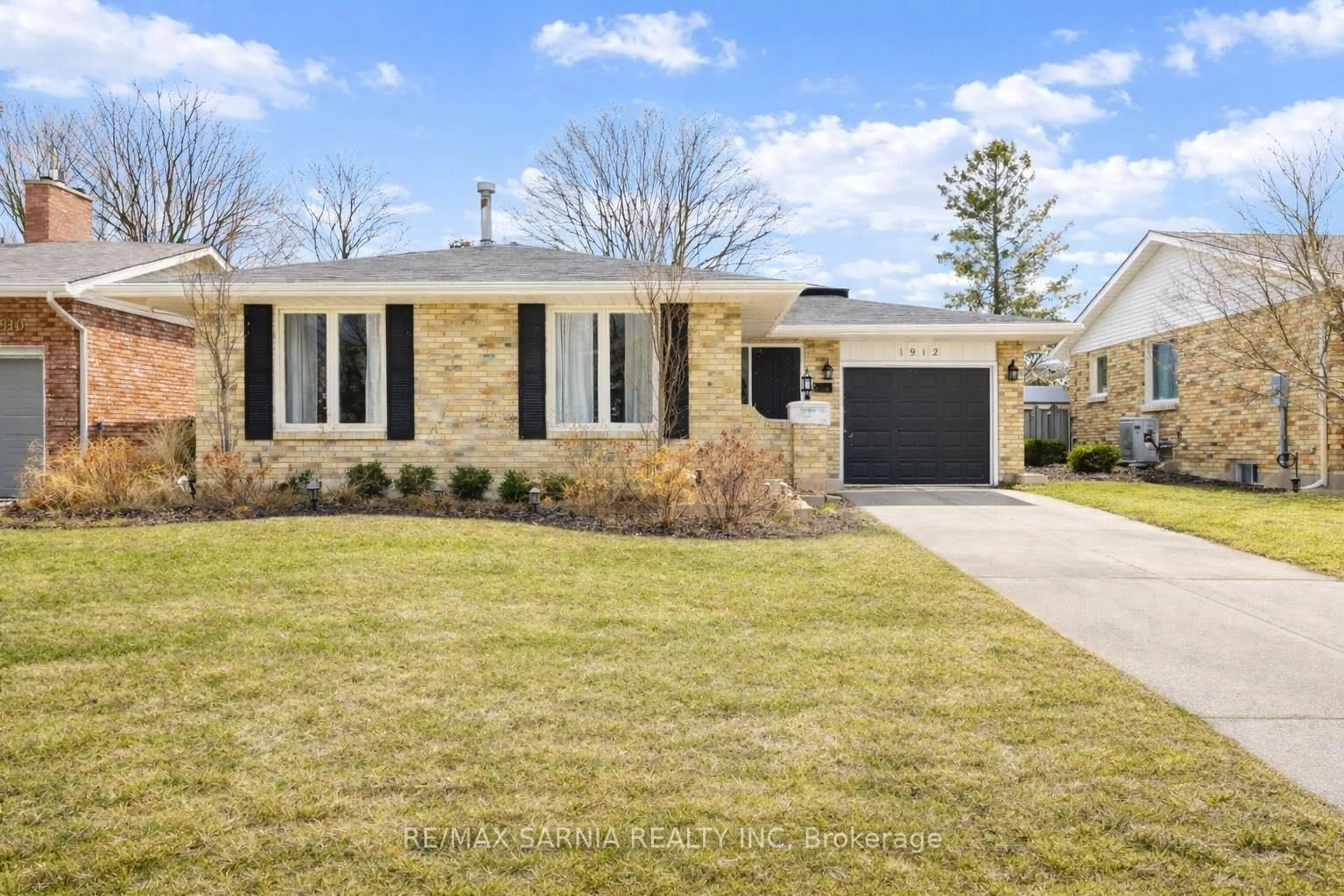 Home with brick exterior material, street for 1912 Winslow Cres, Sarnia Ontario N0N 1C0