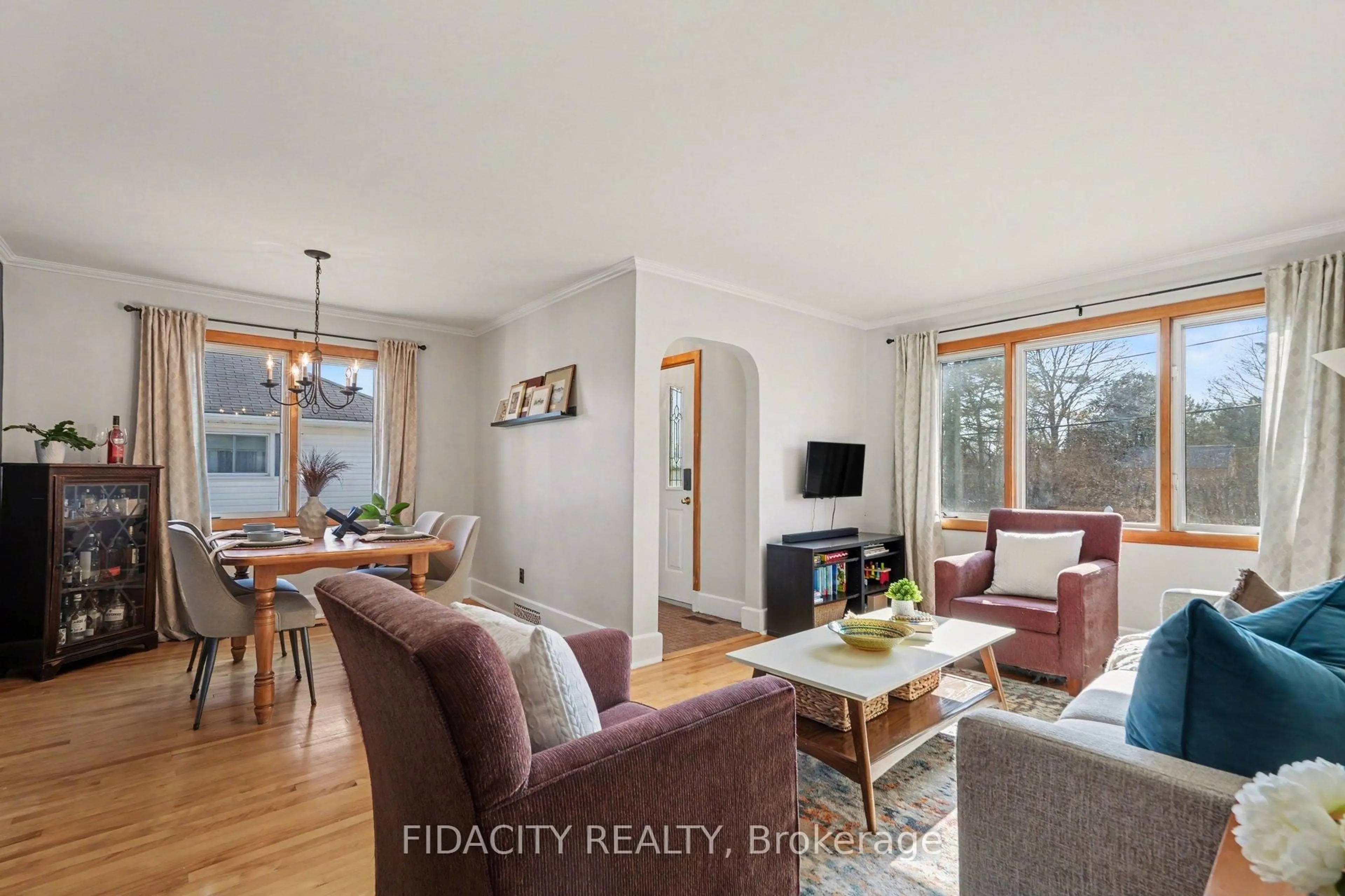 Living room with furniture, wood/laminate floor for 11 Caldwell St, Carleton Place Ontario K7C 3A7