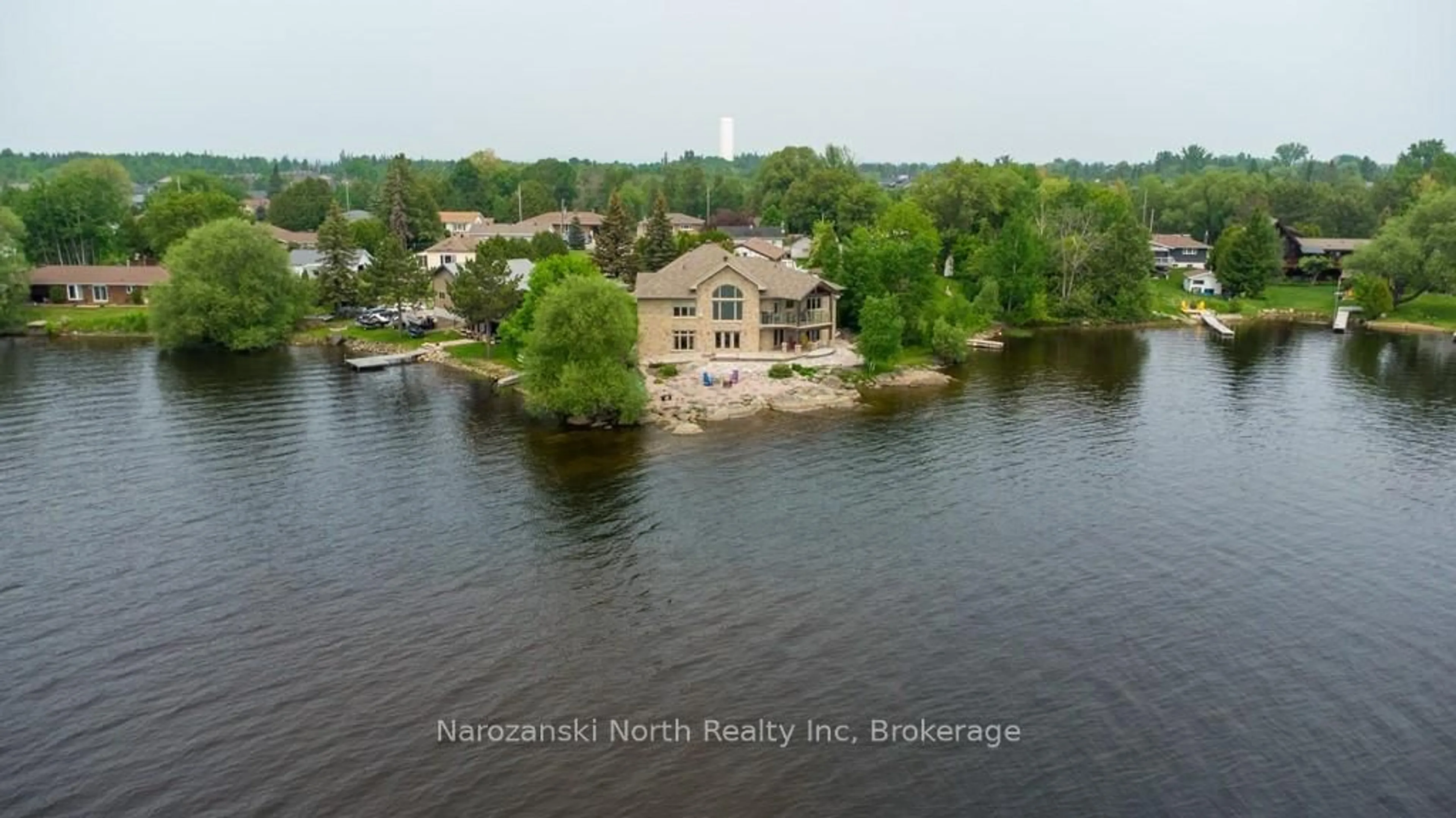 A pic from outside/outdoor area/front of a property/back of a property/a pic from drone, water/lake/river/ocean view for 8 Telesphore St, Greater Sudbury Ontario P0M 1B0