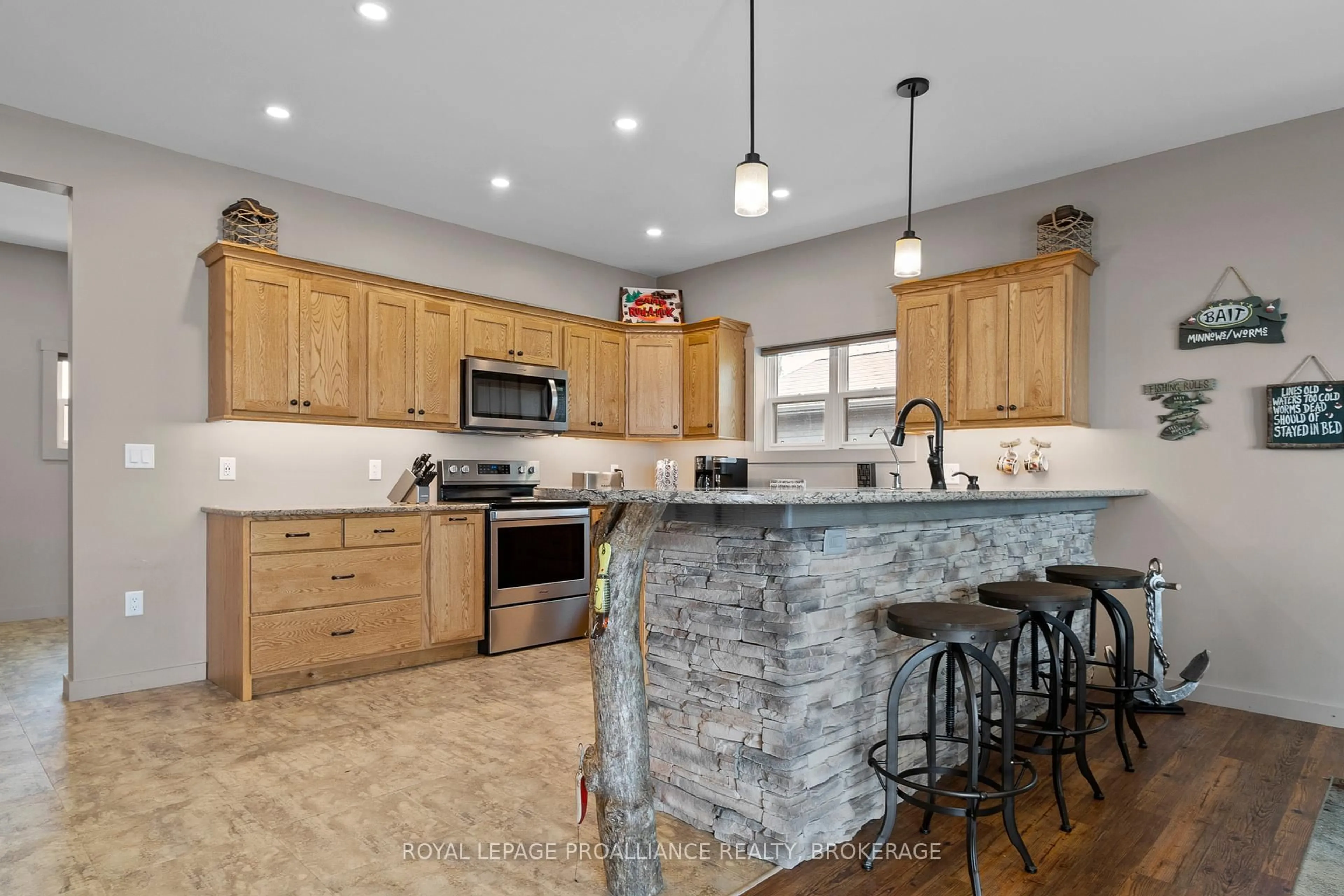 Open concept kitchen, ceramic/tile floor for 199 & 213 Leone's Cove Lane, Wolfe Island Ontario K0H 2Y0