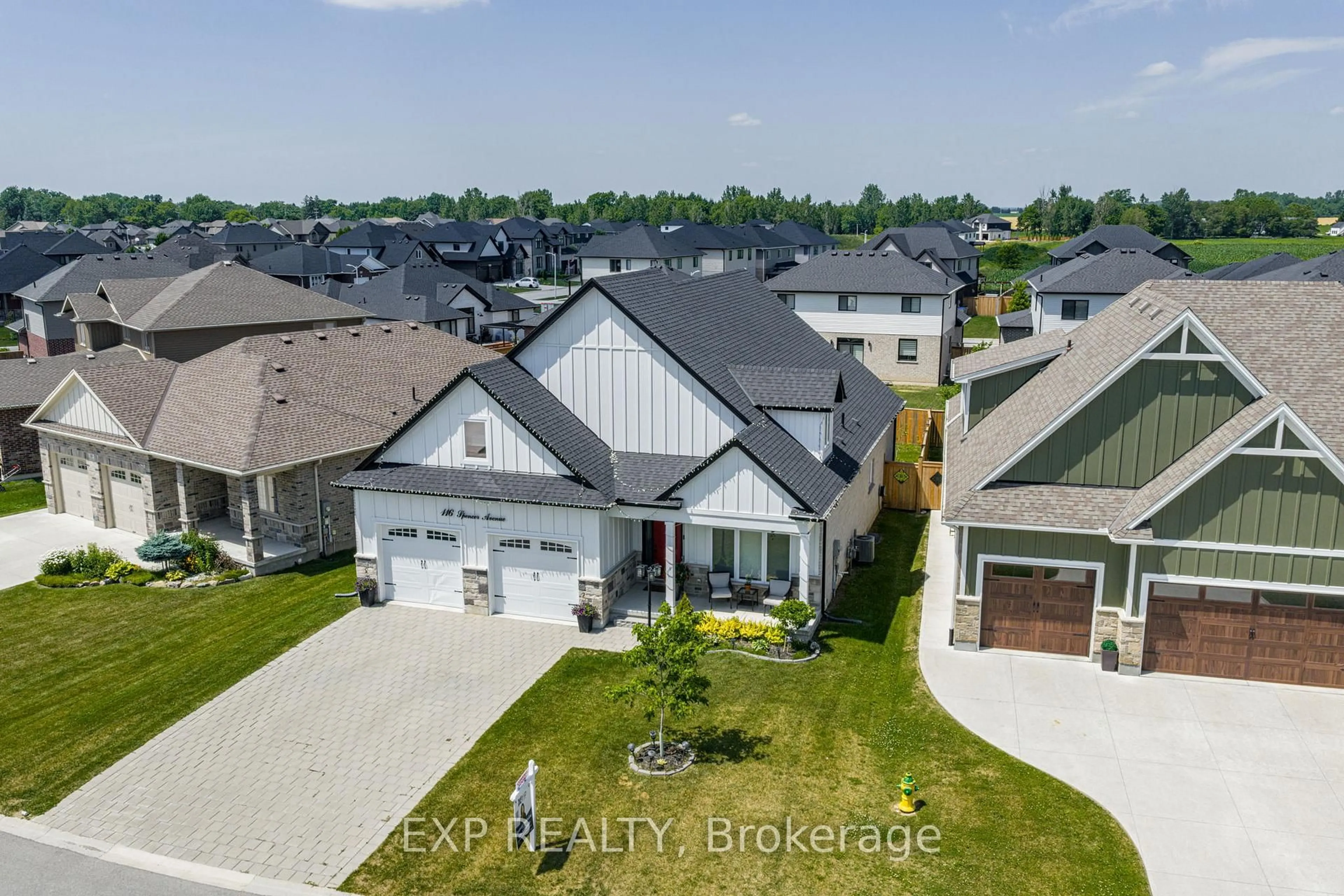 A pic from outside/outdoor area/front of a property/back of a property/a pic from drone, street for 116 Spencer Ave, Lucan Biddulph Ontario N0M 2J0
