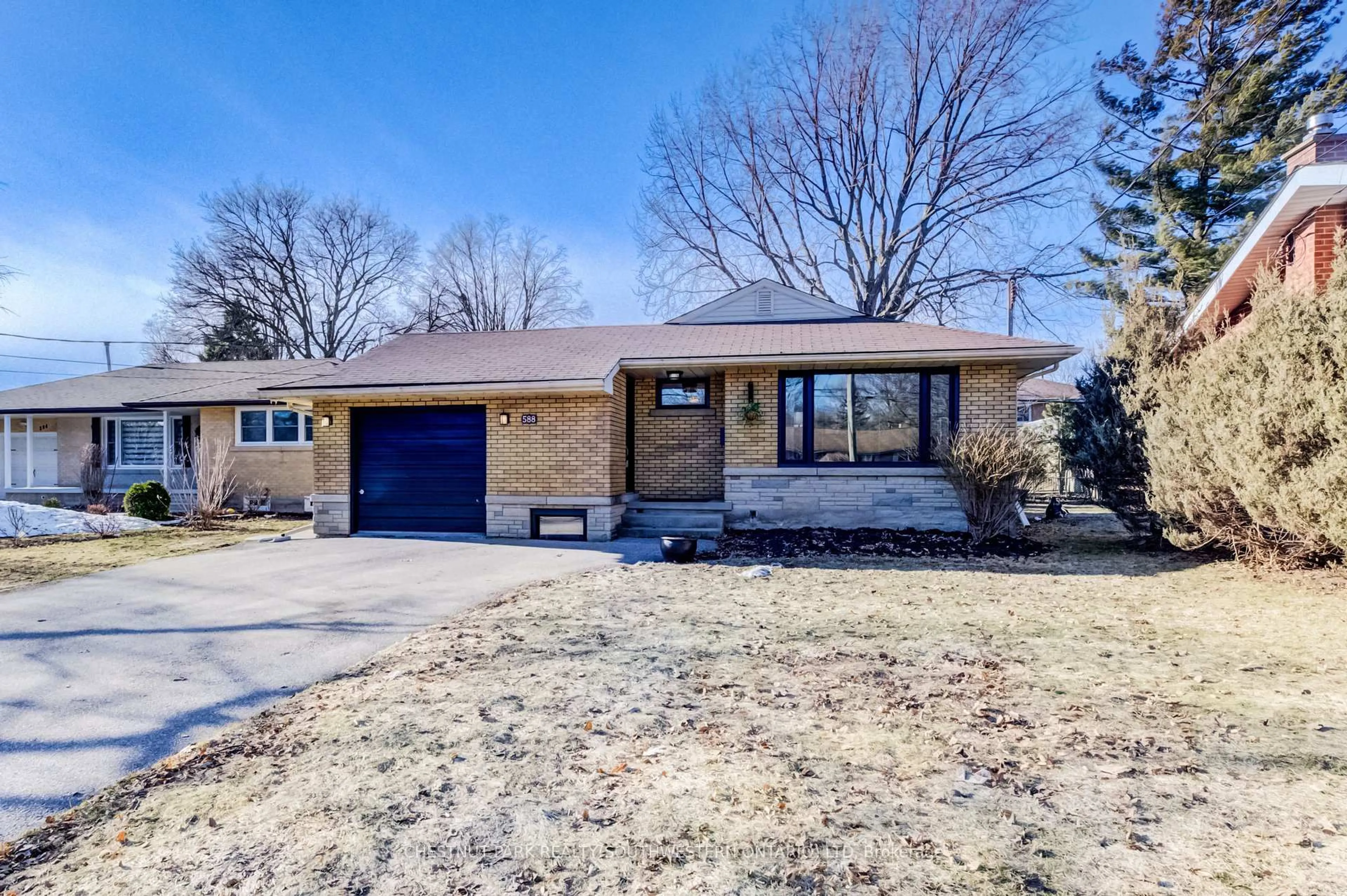 Home with brick exterior material, street for 588 Krug St, Kitchener Ontario N2B 1L7