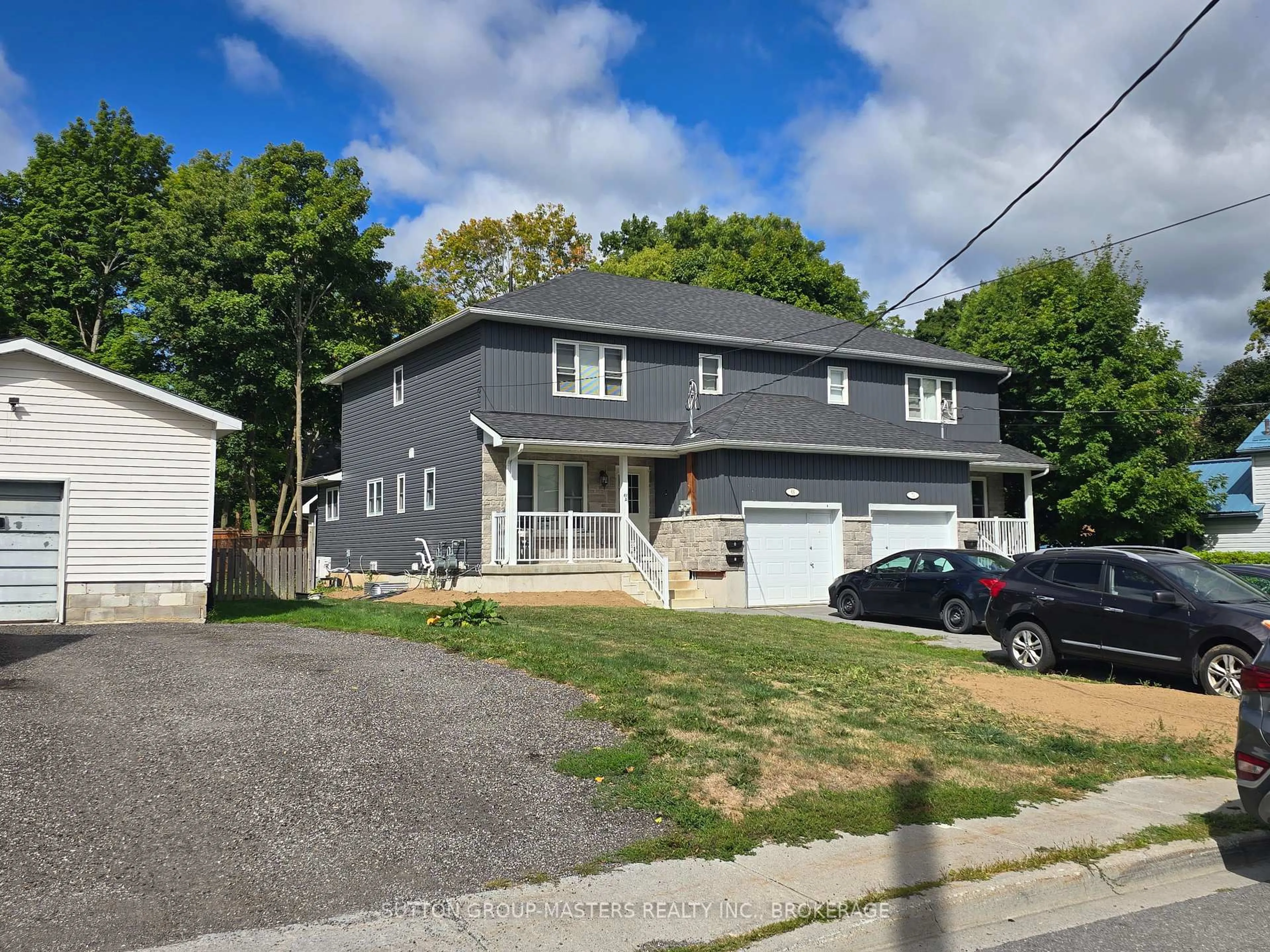 Home with vinyl exterior material, street for 68 Hickory St, Gananoque Ontario K7G 2P5